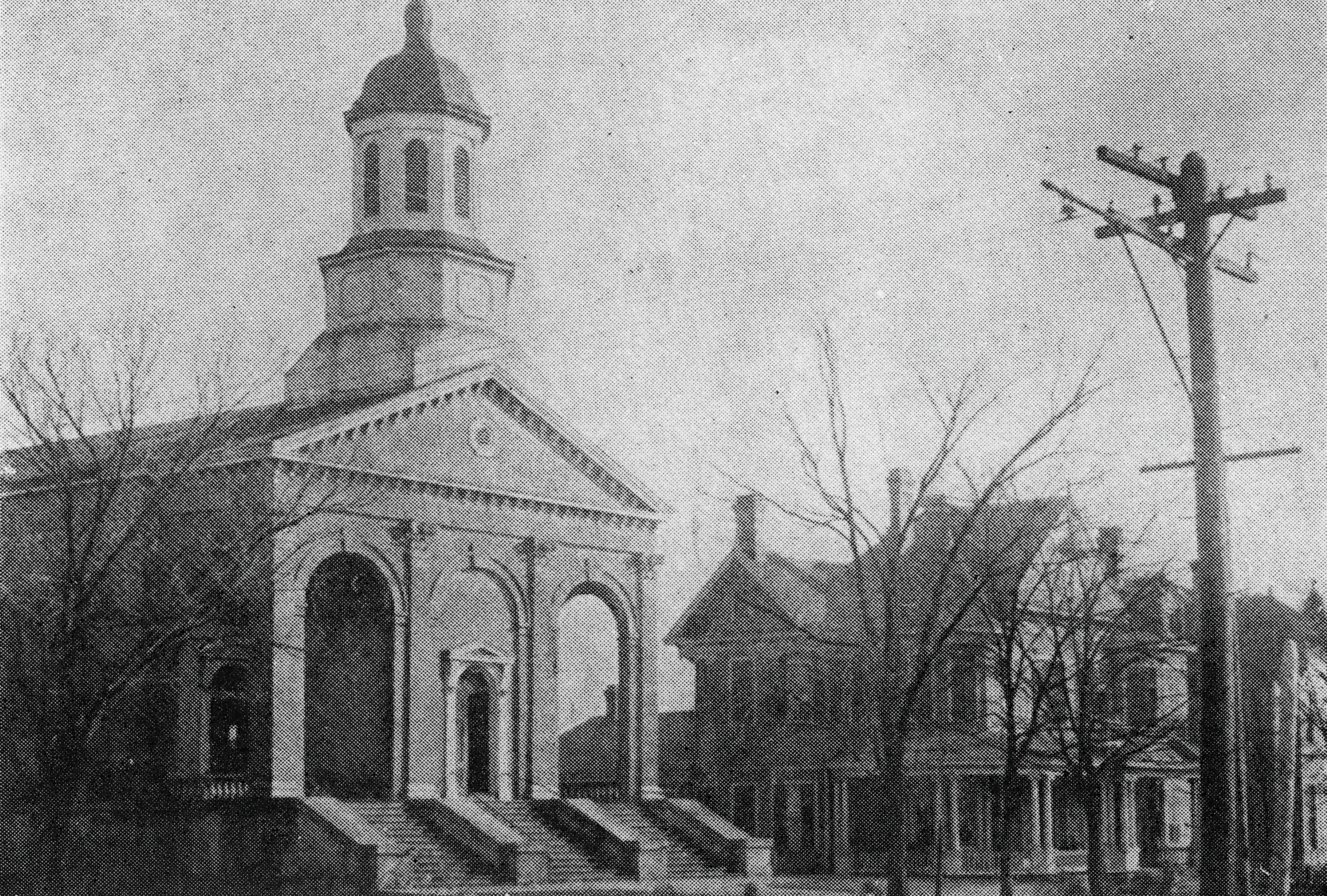 The First St. Paul Church in Columbus, built 1859 with L. Pierce as first pastor. The church was destroyed by lightening in 1901.