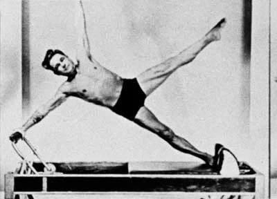  Joseph Pilates on his apparatus