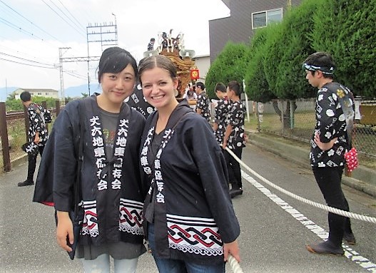 Participating in the Danjiri Festival with home visit family.