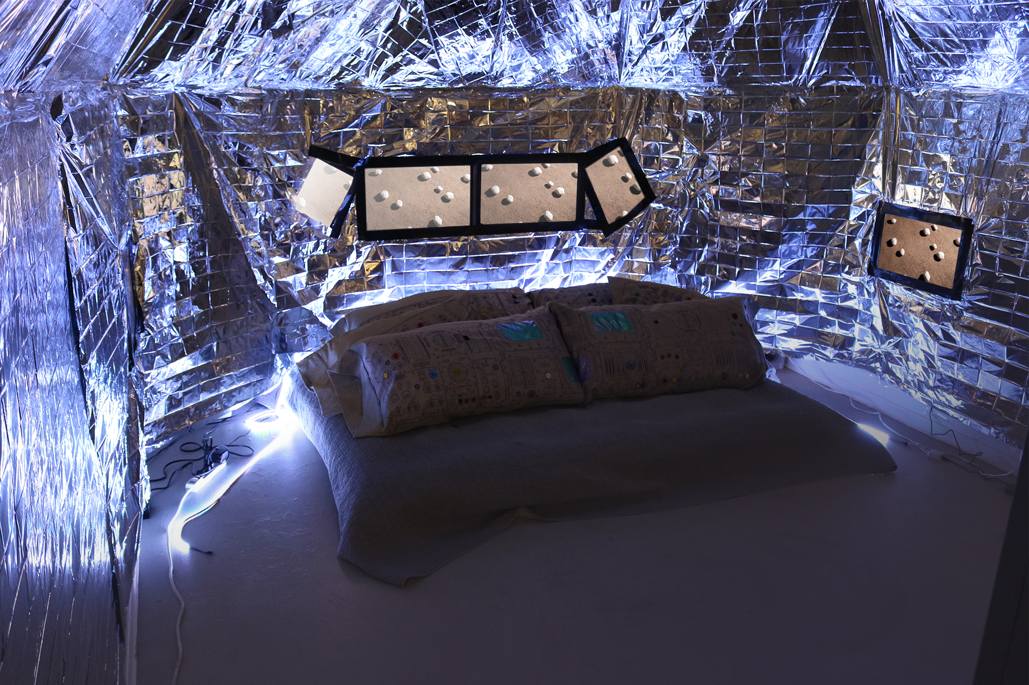 Not Here 2017 installation: screenprinted pillows and bed, stop motion animation, looped music