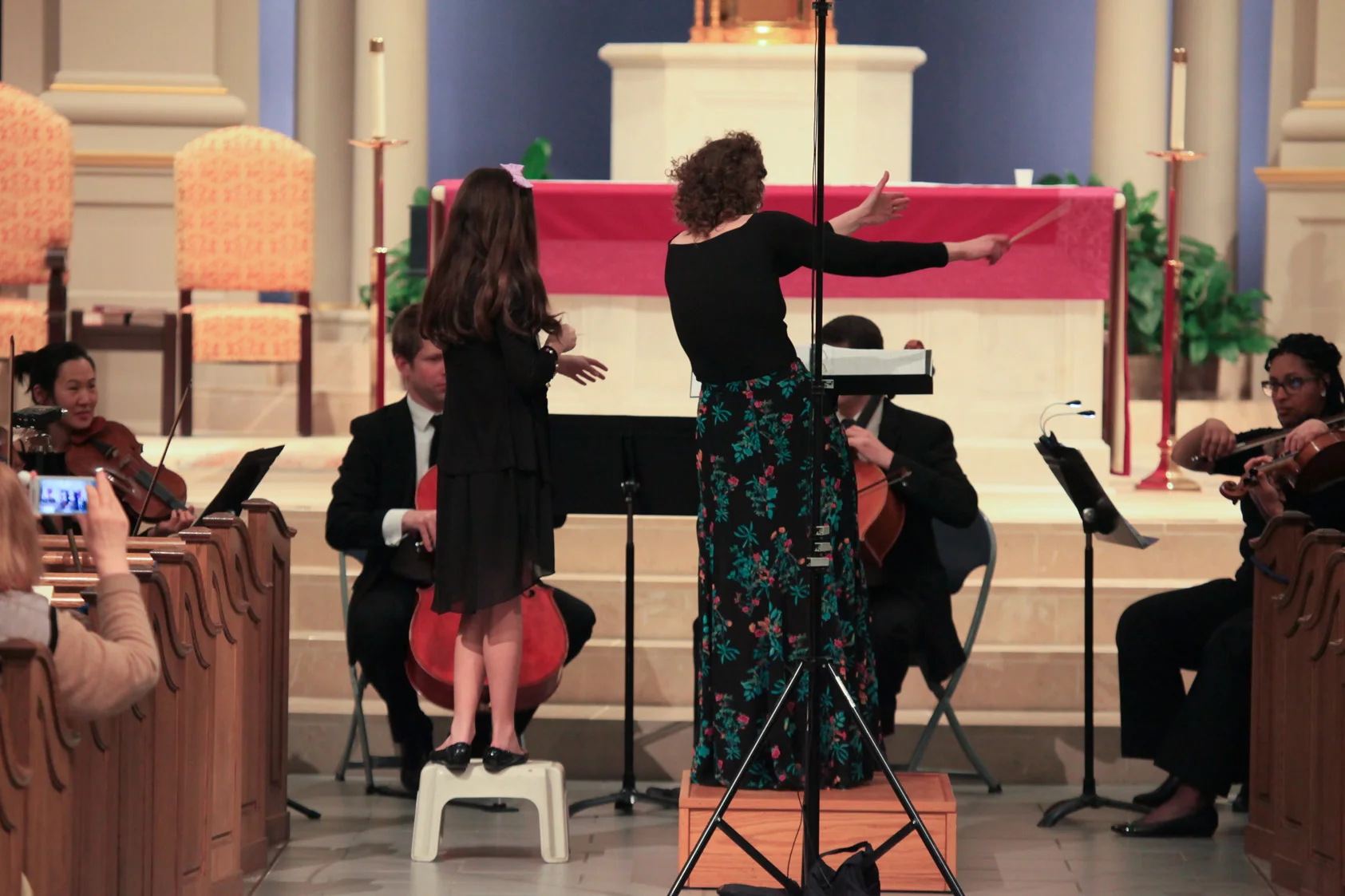 Heather Adelsberger and assistant, conducting