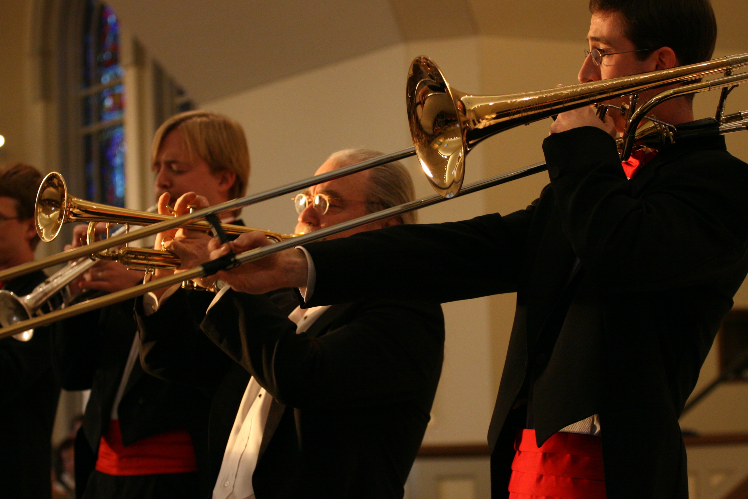 Michael Lowe, trumpet; Patrick Whitehead, trumpet; Gregory Freeman, trombone