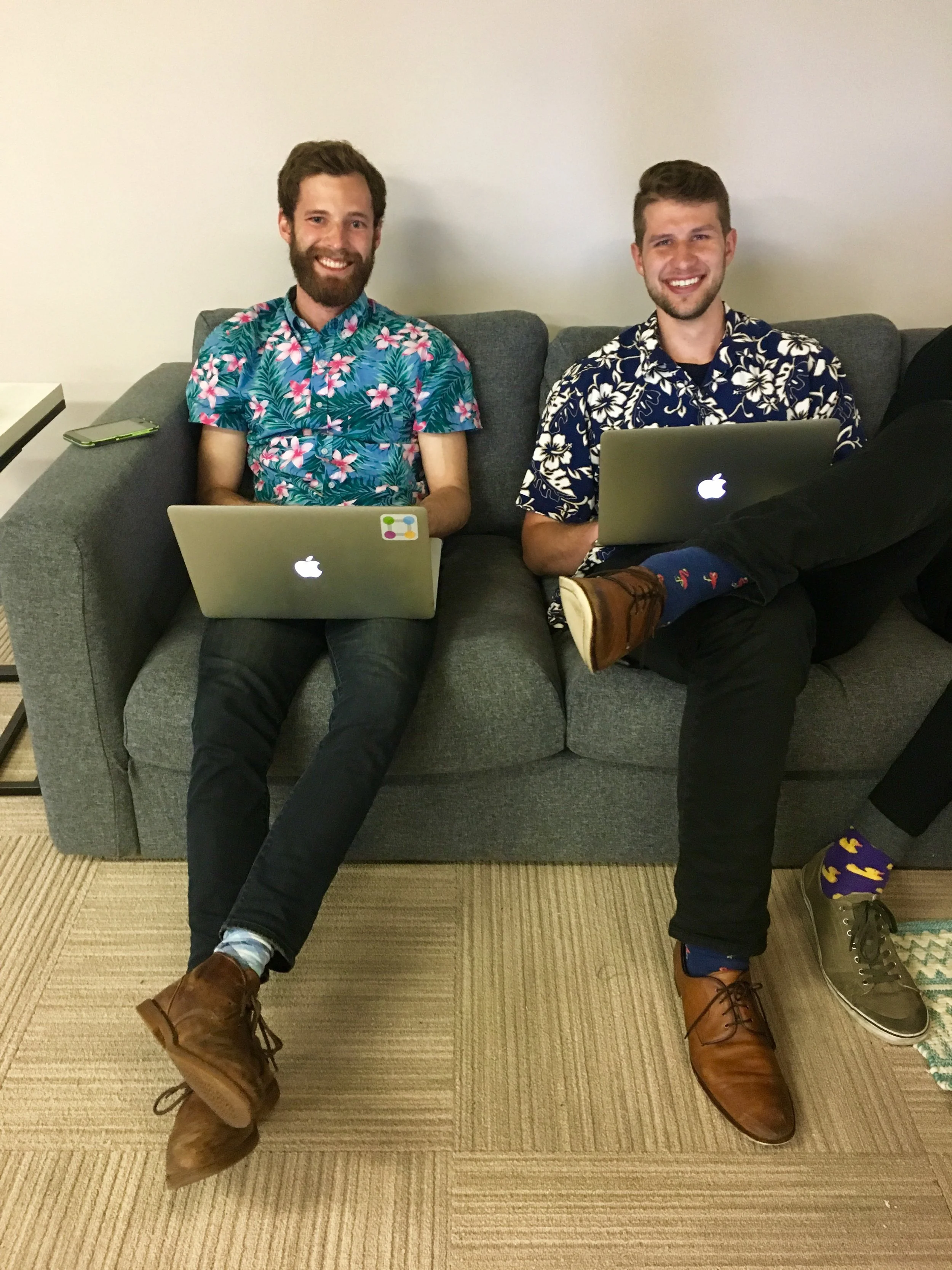 Adam & our communications specialist andrzej celebrating hawaiian shirt friday