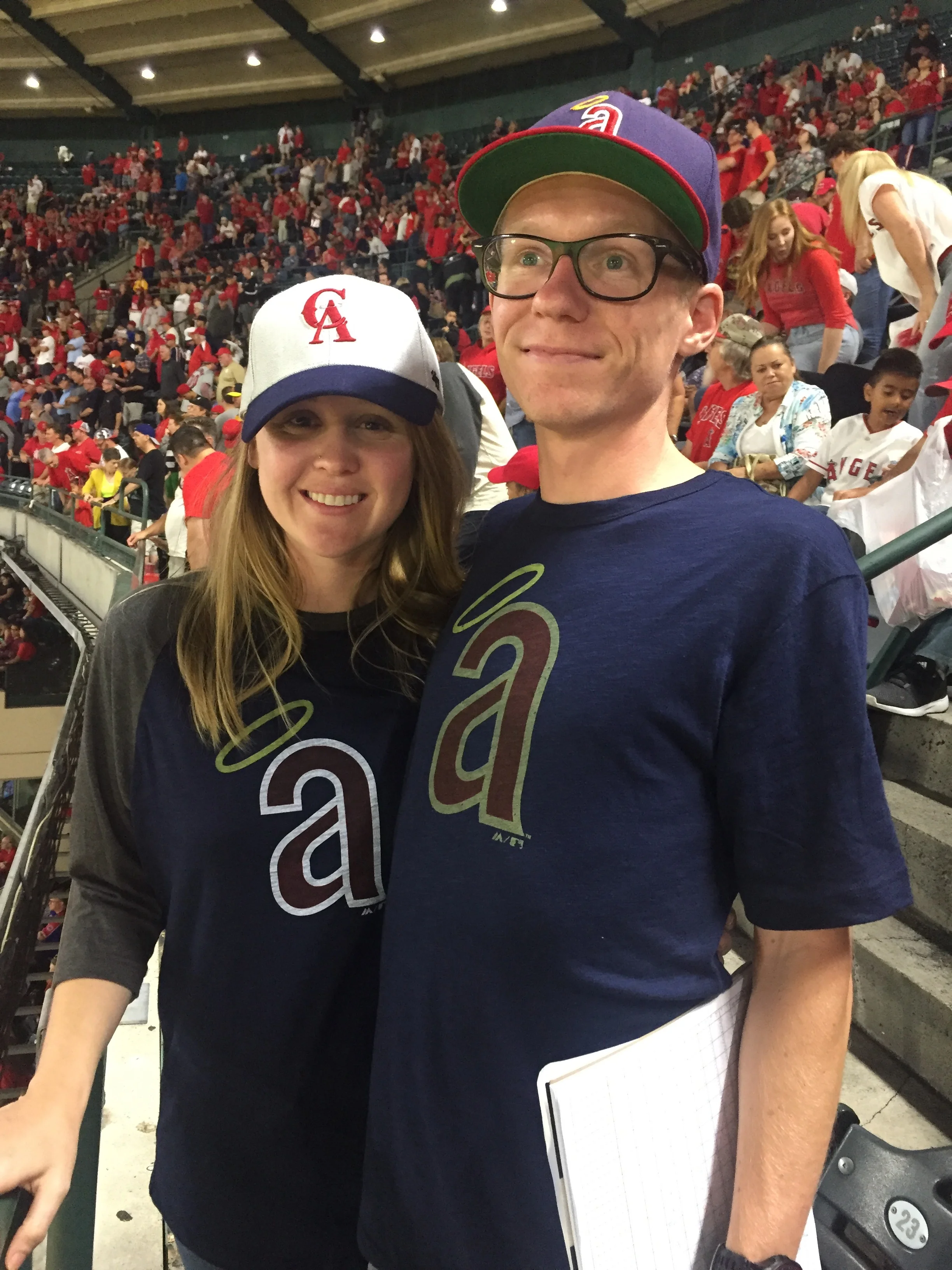 samantha and her husband, thomas, at an angels game