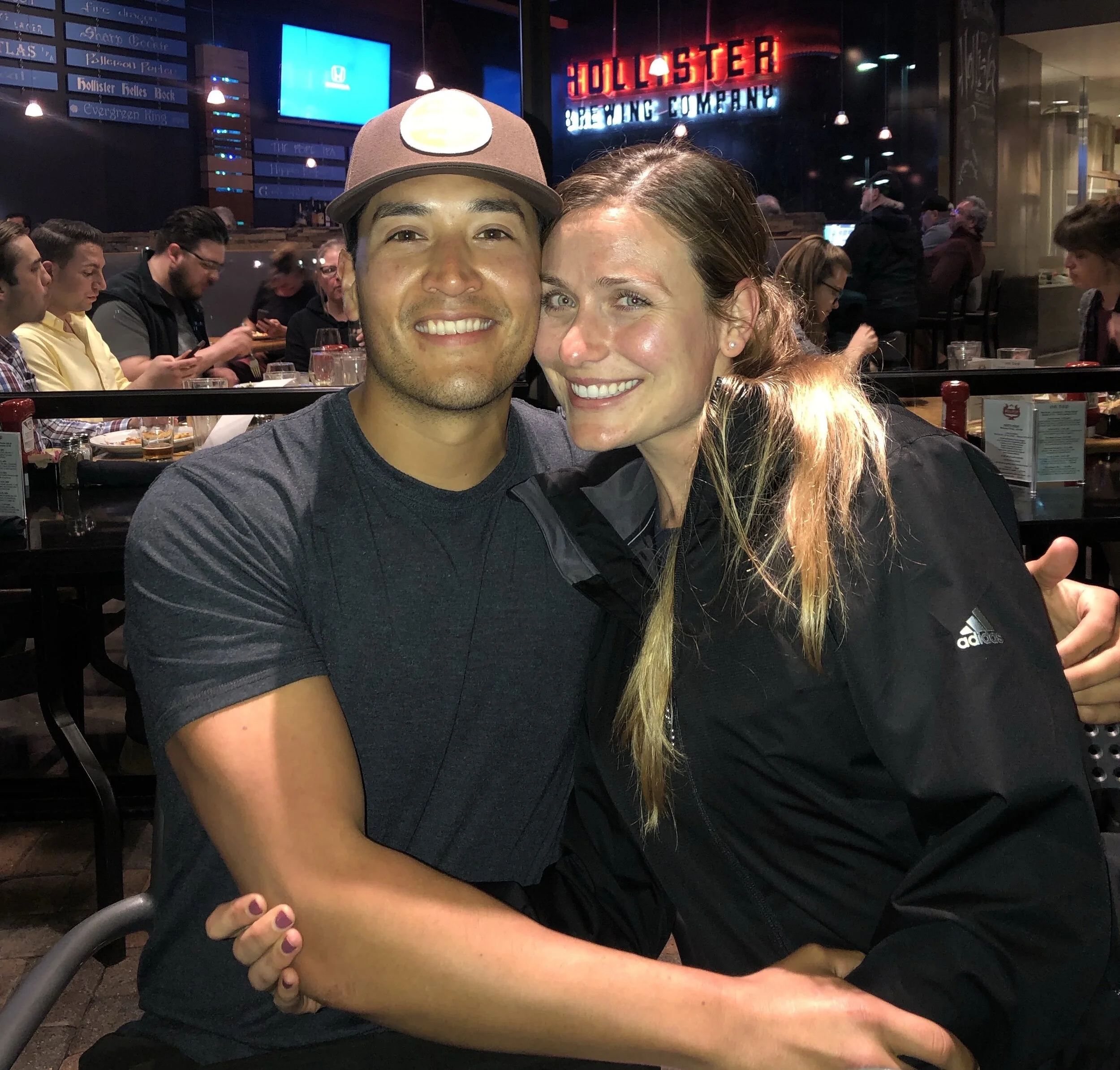 Theresa grabbing a bite to eat at her favorite restaurant with hondo, her fiancé.