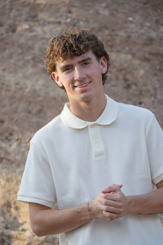 Male senior portrait in Englewood, Highlands Ranch, Colorado — outdoor natural light session.