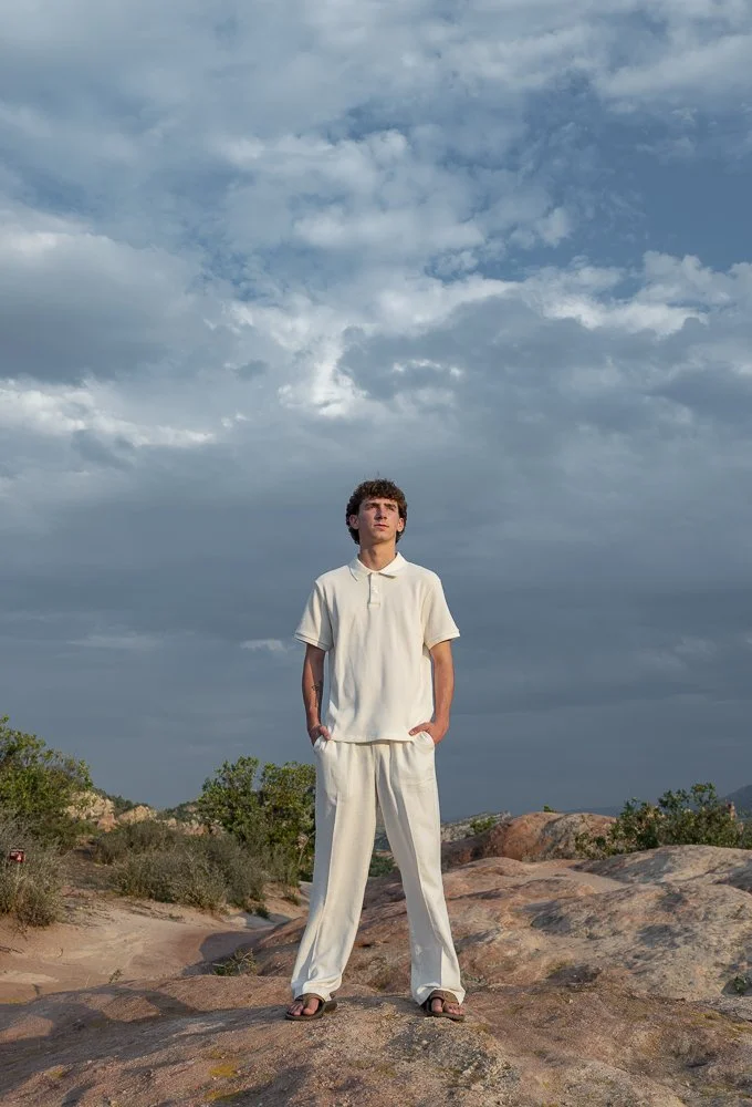 Male senior portrait session with Colorado red rocks Colorado and natural light photography.