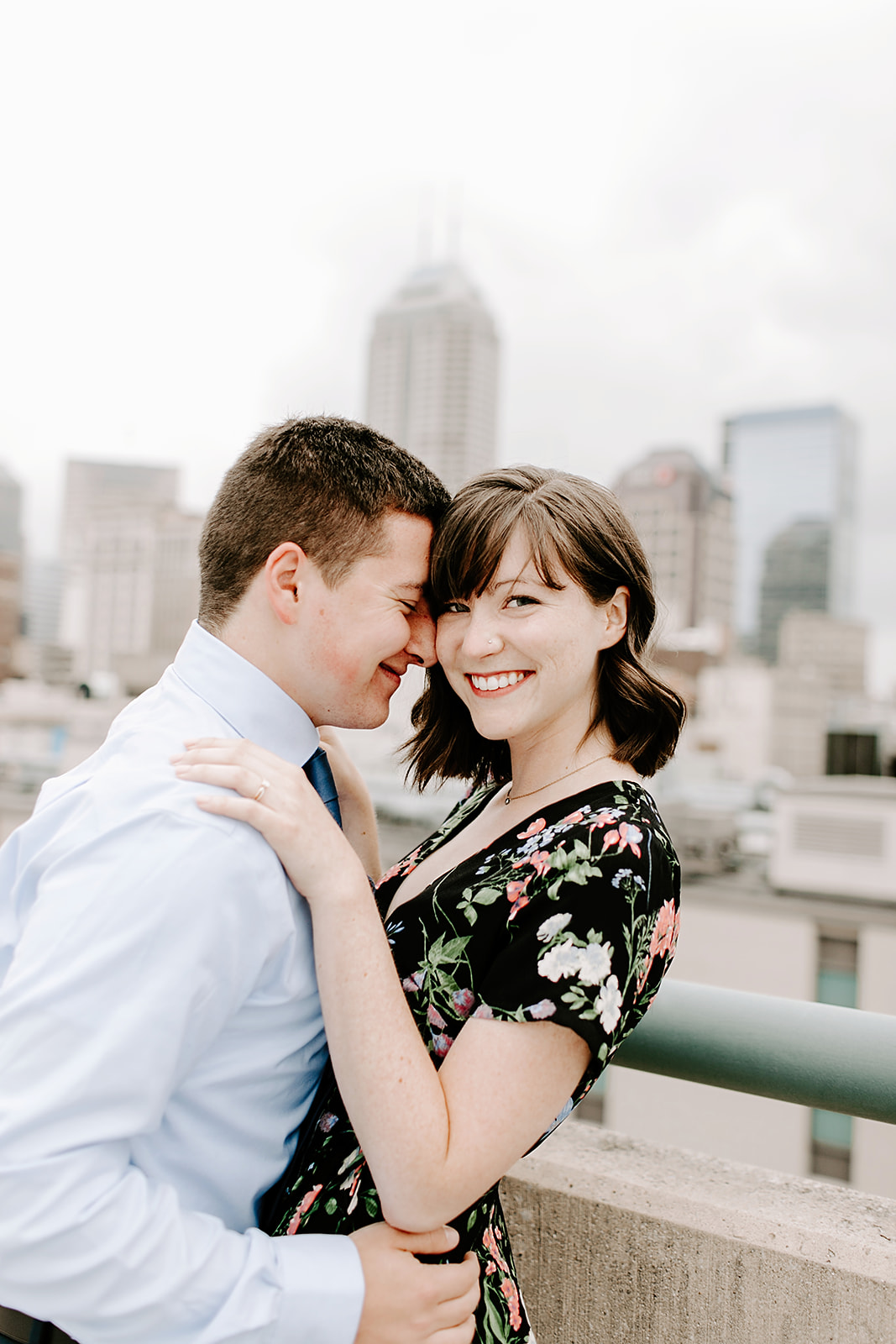   Click to browse the blog of this Downtown Indianapolis Engagement Session with Emily and Davis by Emily Wehner, Indianapolis photographer. Posing inspiration | Couples session location ideas | Urban engagement session #photography #engagementphotog