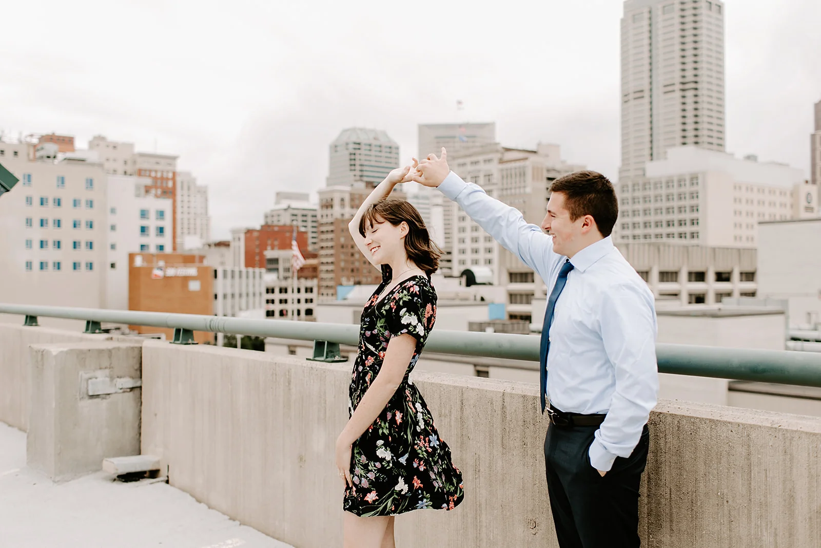 Click to browse the blog of this Downtown Indianapolis Engagement Session with Emily and Davis by Emily Wehner, Indianapolis photographer. Posing inspiration | Couples session location ideas | Urban engagement session #photography #engagementphotography #posinginspiration #urbancouplessession