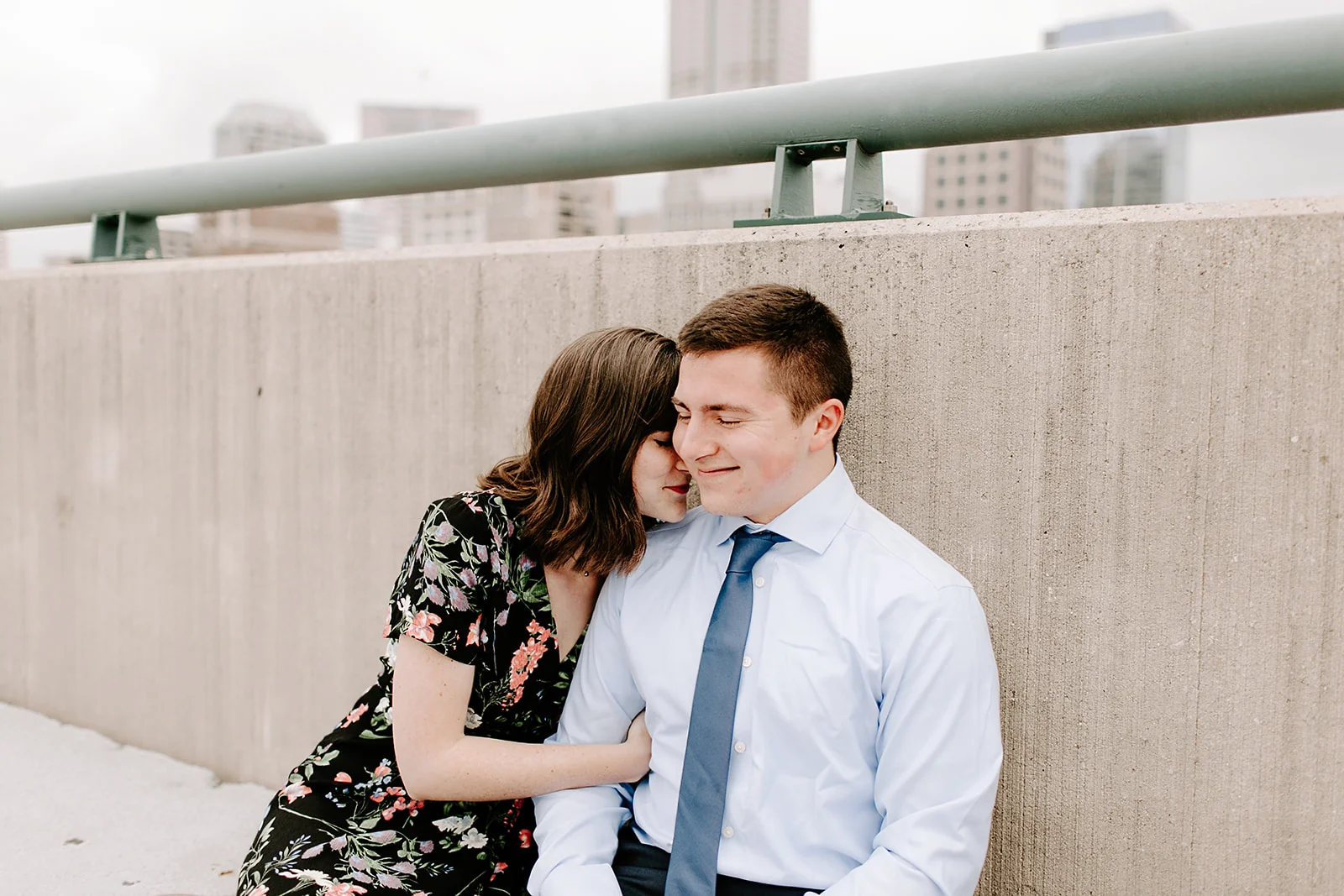 Click to browse the blog of this Downtown Indianapolis Engagement Session with Emily and Davis by Emily Wehner, Indianapolis photographer. Posing inspiration | Couples session location ideas | Urban engagement session #photography #engagementphotography #posinginspiration #urbancouplessession