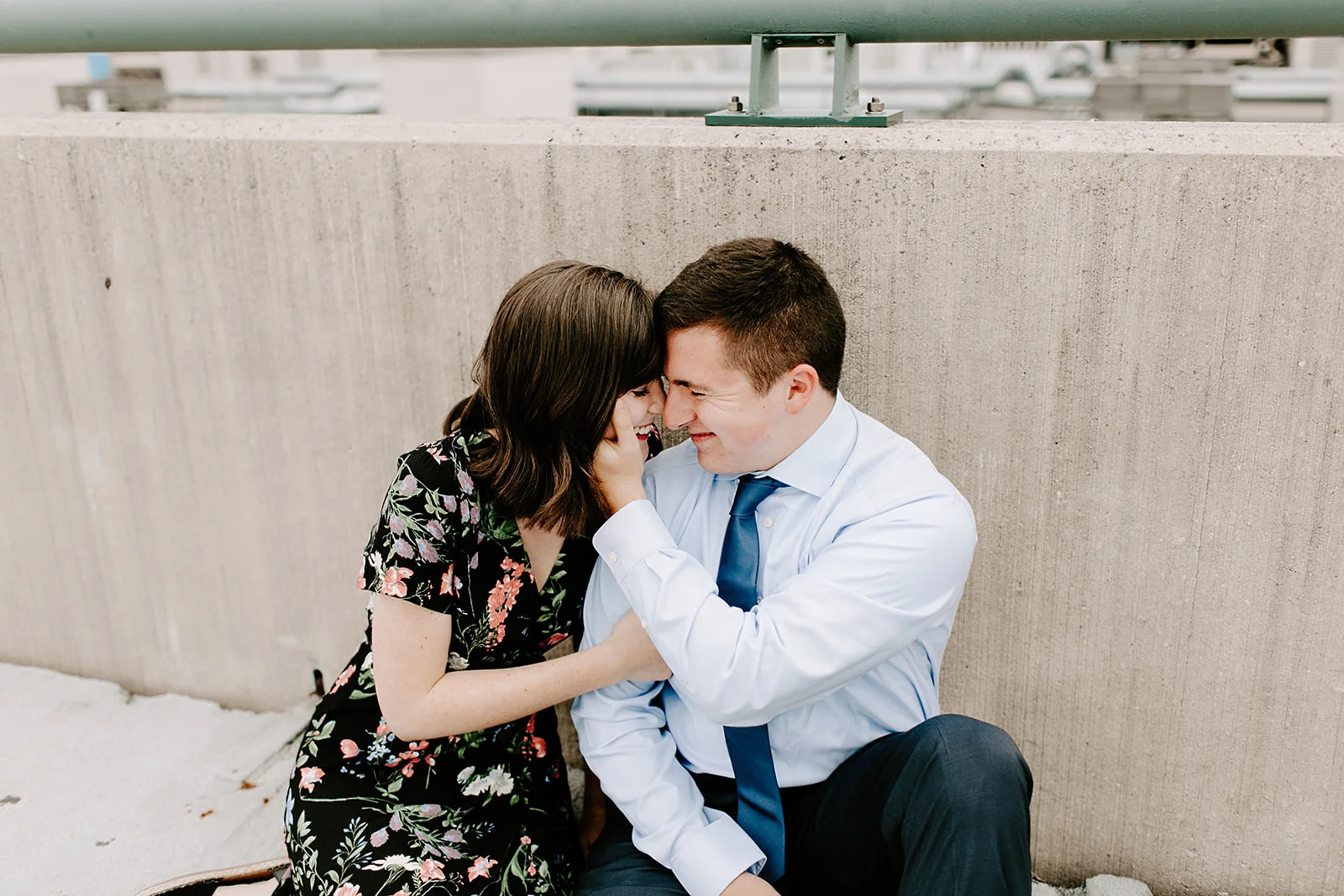Click to browse the blog of this Downtown Indianapolis Engagement Session with Emily and Davis by Emily Wehner, Indianapolis photographer. Posing inspiration | Couples session location ideas | Urban engagement session #photography #engagementphotography #posinginspiration #urbancouplessession