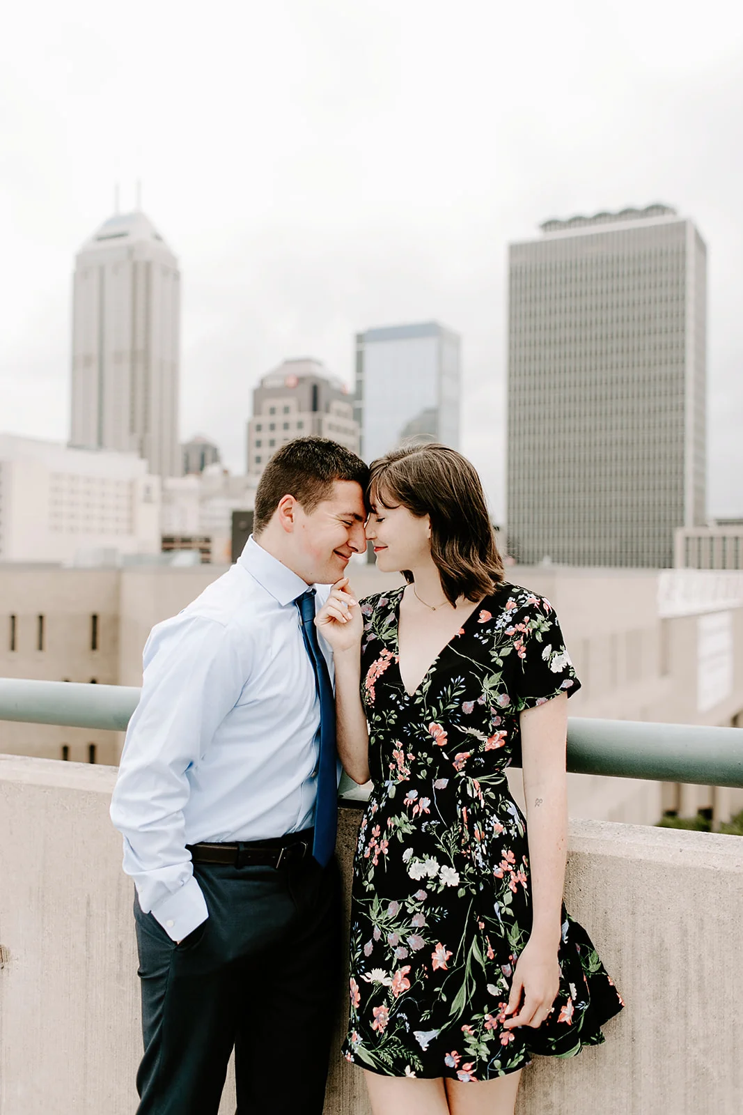 Click to browse the blog of this Downtown Indianapolis Engagement Session with Emily and Davis by Emily Wehner, Indianapolis photographer. Posing inspiration | Couples session location ideas | Urban engagement session #photography #engagementphotography #posinginspiration #urbancouplessession