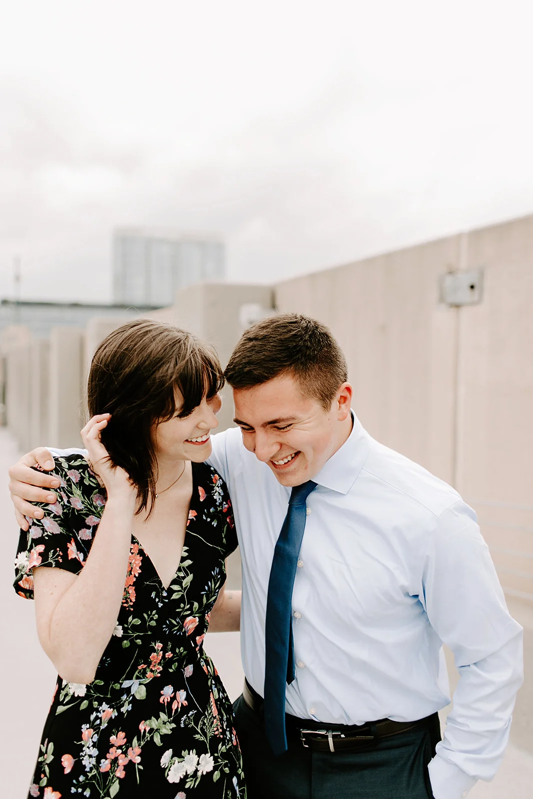 Click to browse the blog of this Downtown Indianapolis Engagement Session with Emily and Davis by Emily Wehner, Indianapolis photographer. Posing inspiration | Couples session location ideas | Urban engagement session #photography #engagementphotography #posinginspiration #urbancouplessession