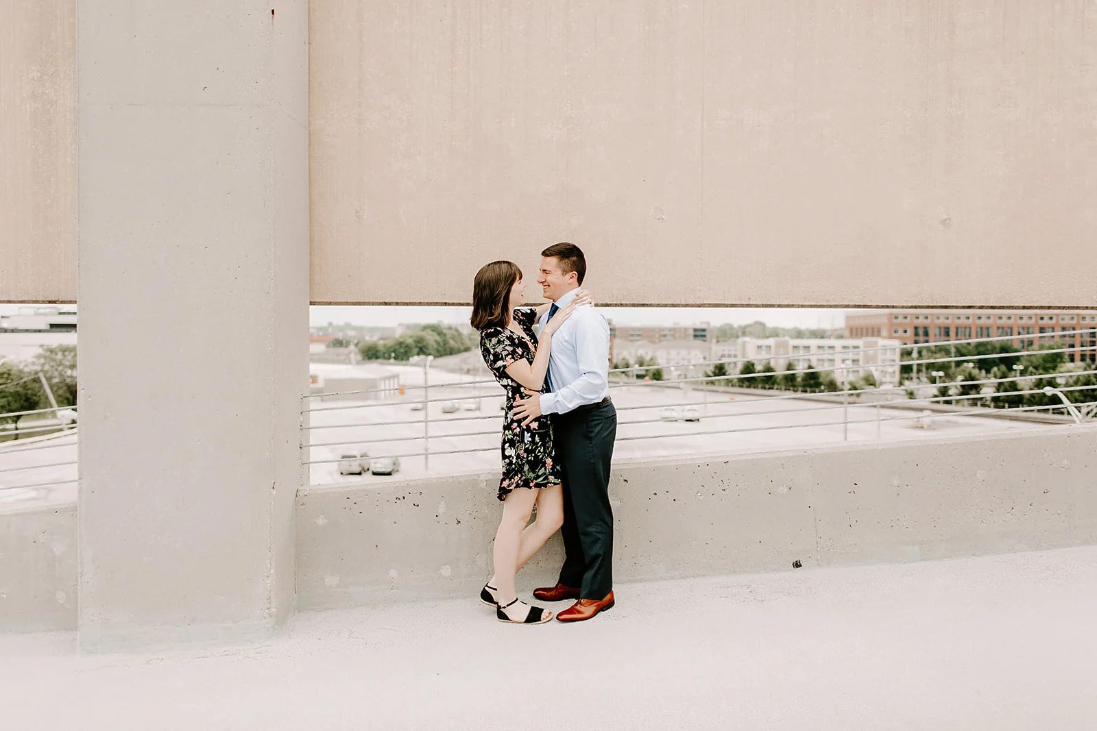 Click to browse the blog of this Downtown Indianapolis Engagement Session with Emily and Davis by Emily Wehner, Indianapolis photographer. Posing inspiration | Couples session location ideas | Urban engagement session #photography #engagementphotography #posinginspiration #urbancouplessession