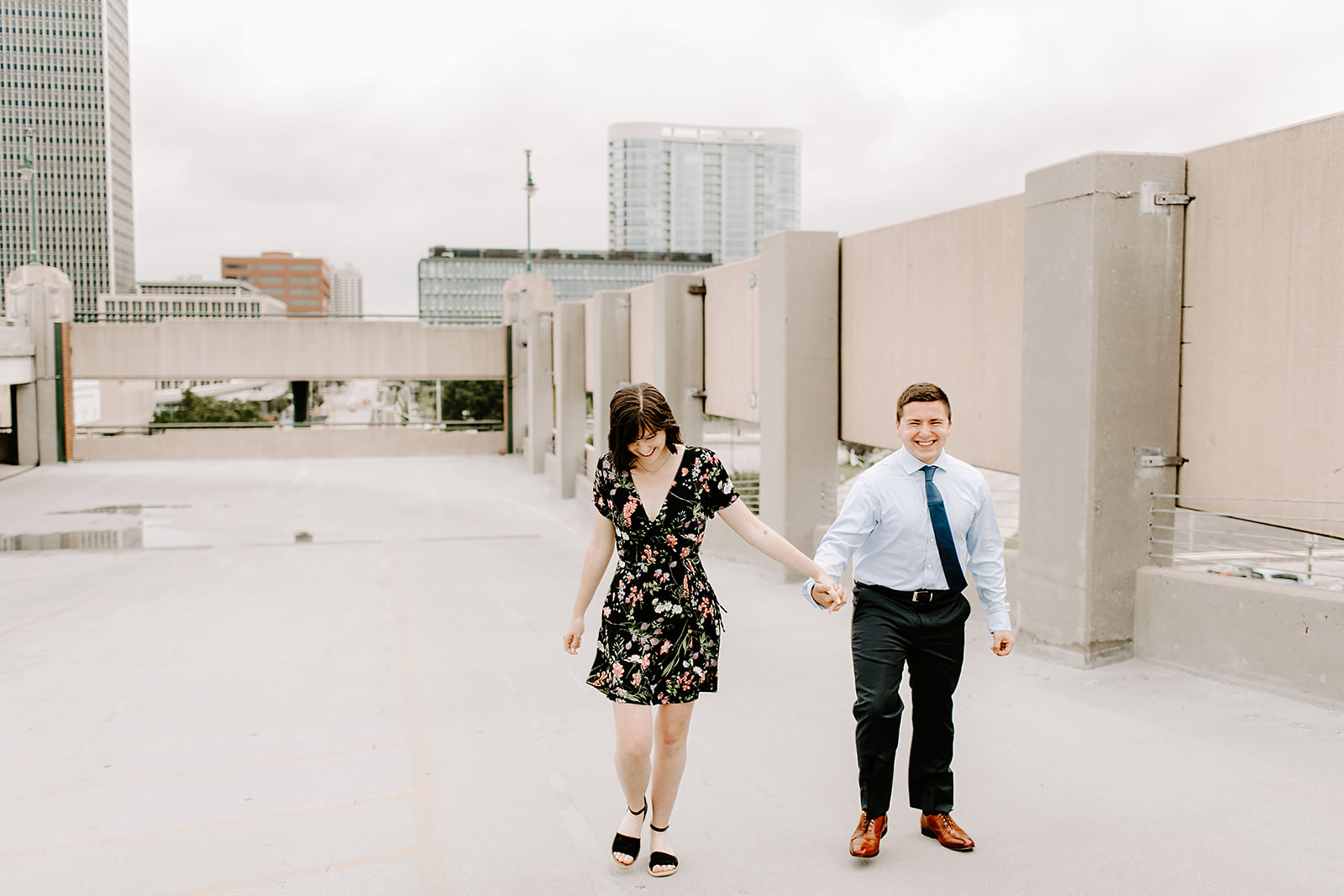   Click to browse the blog of this Downtown Indianapolis Engagement Session with Emily and Davis by Emily Wehner, Indianapolis photographer. Posing inspiration | Couples session location ideas | Urban engagement session #photography #engagementphotog