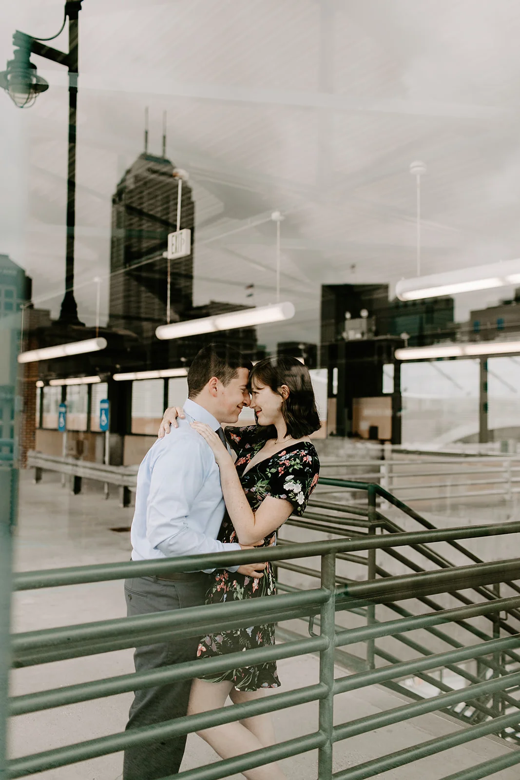 Click to browse the blog of this Downtown Indianapolis Engagement Session with Emily and Davis by Emily Wehner, Indianapolis photographer. Posing inspiration | Couples session location ideas | Urban engagement session #photography #engagementphotography #posinginspiration #urbancouplessession