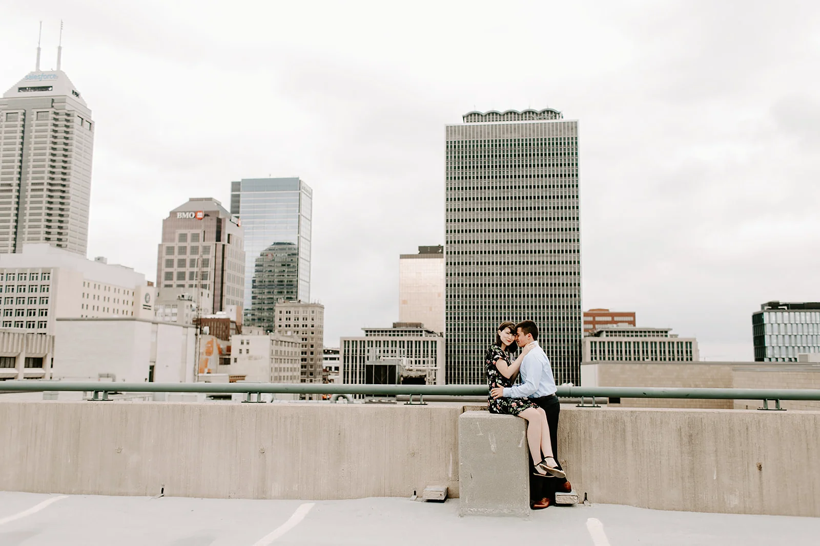 Click to browse the blog of this Downtown Indianapolis Engagement Session with Emily and Davis by Emily Wehner, Indianapolis photographer. Posing inspiration | Couples session location ideas | Urban engagement session #photography #engagementphotography #posinginspiration #urbancouplessession