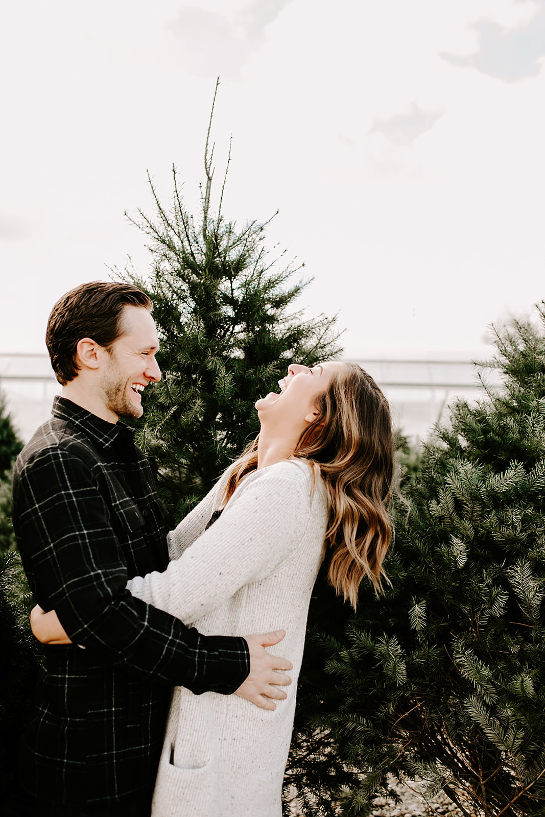  Urban Noblesville, Indiana Engagement Session with Alex and Andy by Emily Elyse Wehner Photography | Posing inspiration | Couples session outfit inspiration | Urban engagement   