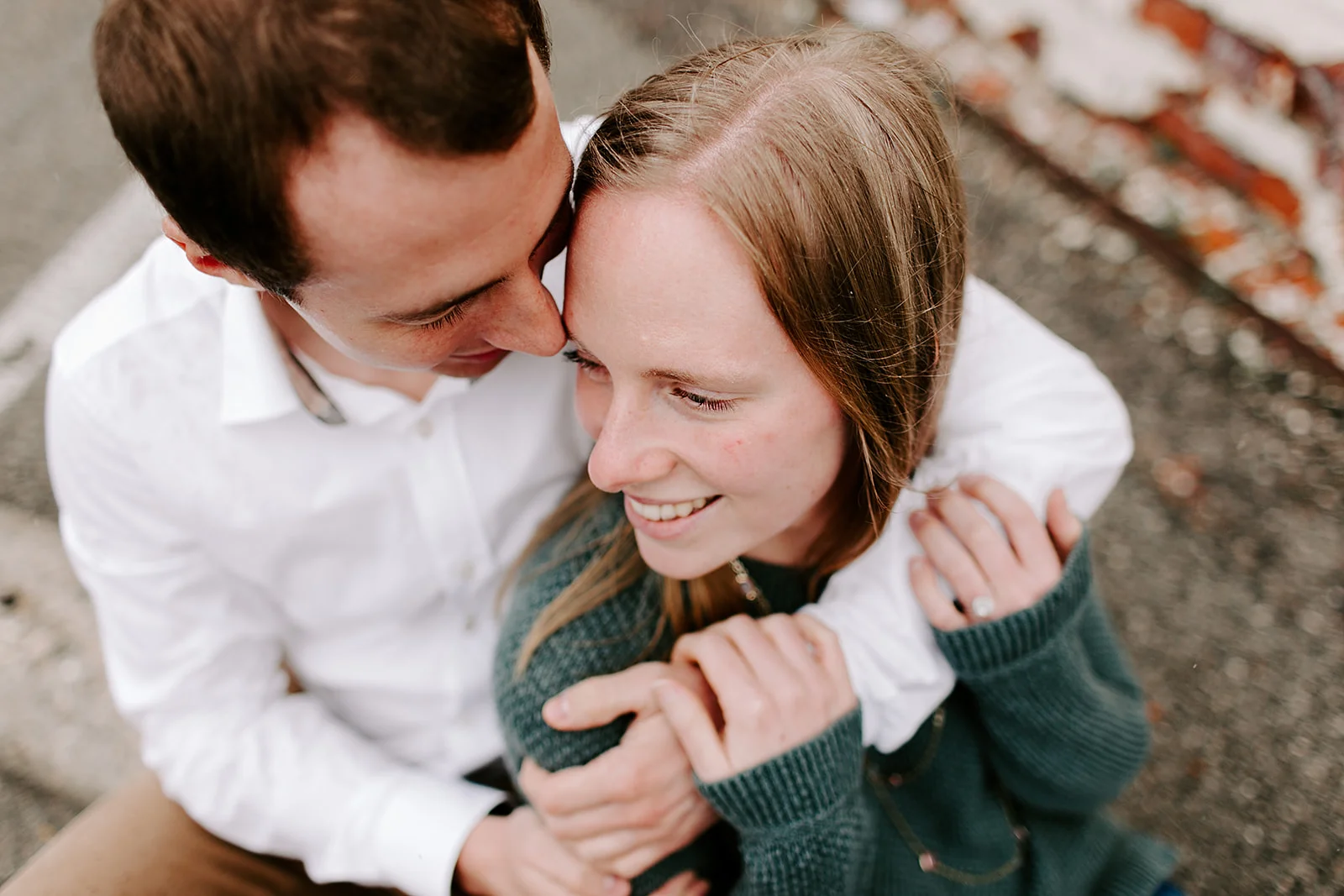 Rainy Noblesville Engagement Session including outfit ideas and posing inspiration | Photography by Emily Elyse Wehner, Noblesville Engagement photographer