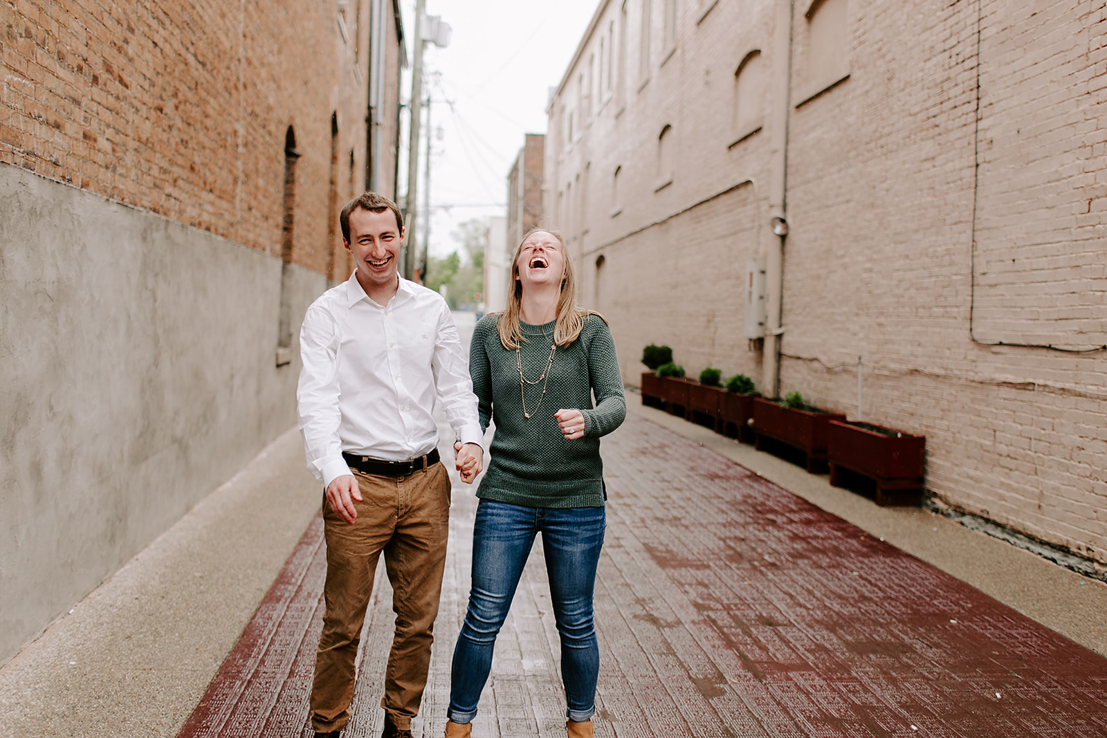 Rainy Noblesville Engagement Session including outfit ideas and posing inspiration | Photography by Emily Elyse Wehner, Noblesville Engagement photographer