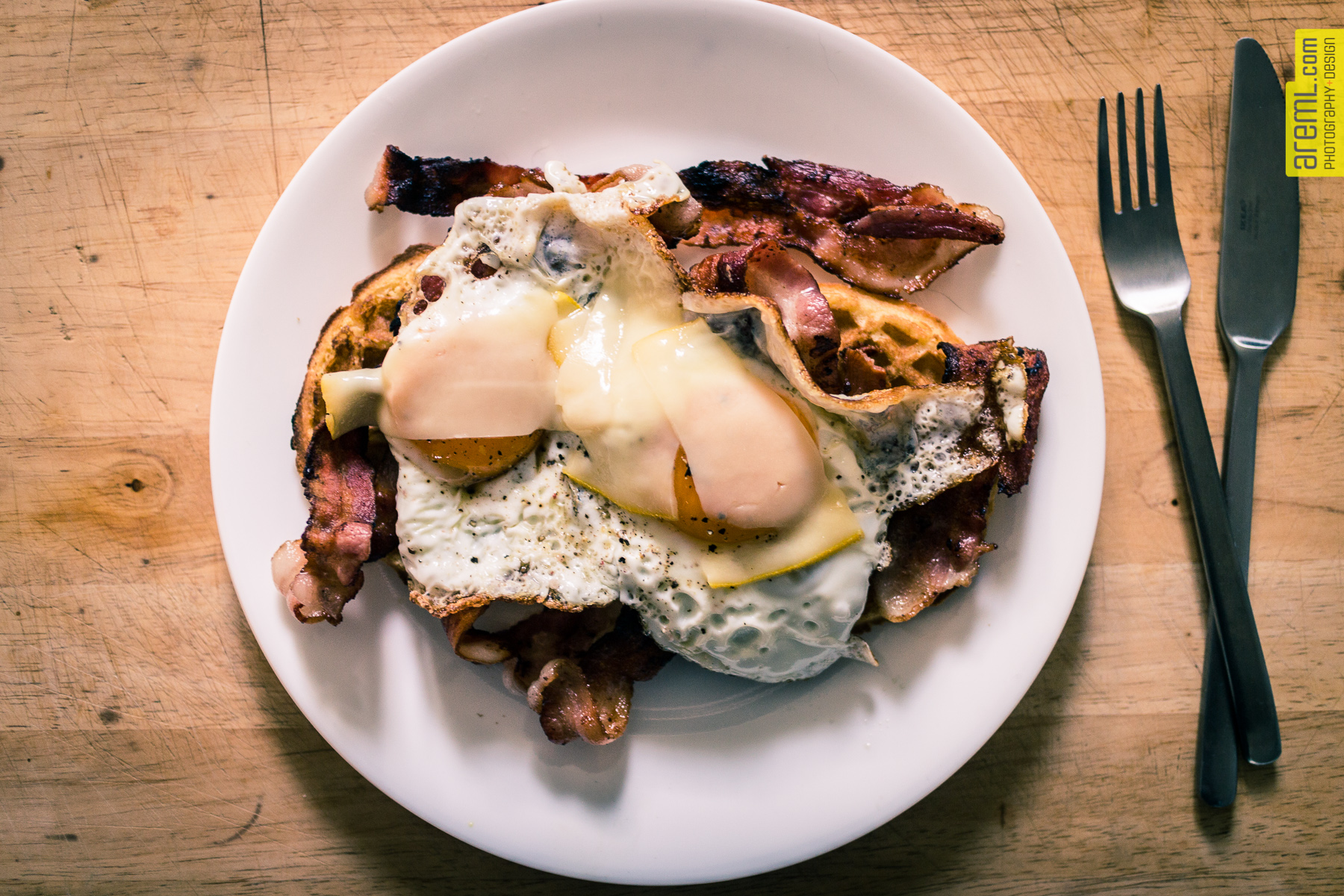 Gluten free waffles, maple smoked bacon, free range eggs and slathered in maple syrup after. 