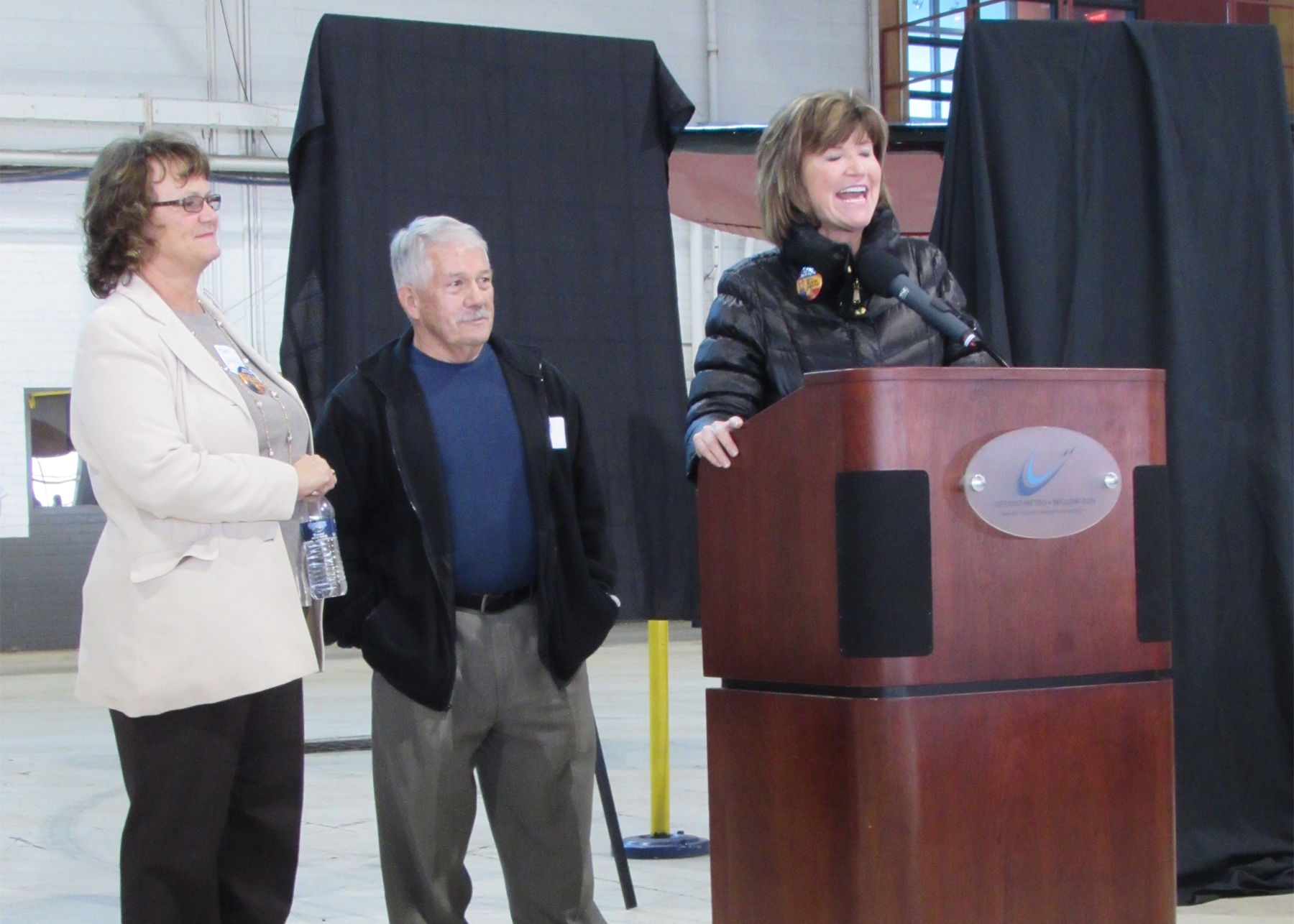 Ypsilanti Township SUpervisor Brenda Stumbo speaks at the October 30, 2014 event at which Yankee Air Museum announced its official purchase of a portion of the historic Willow Run Bomber Plant.