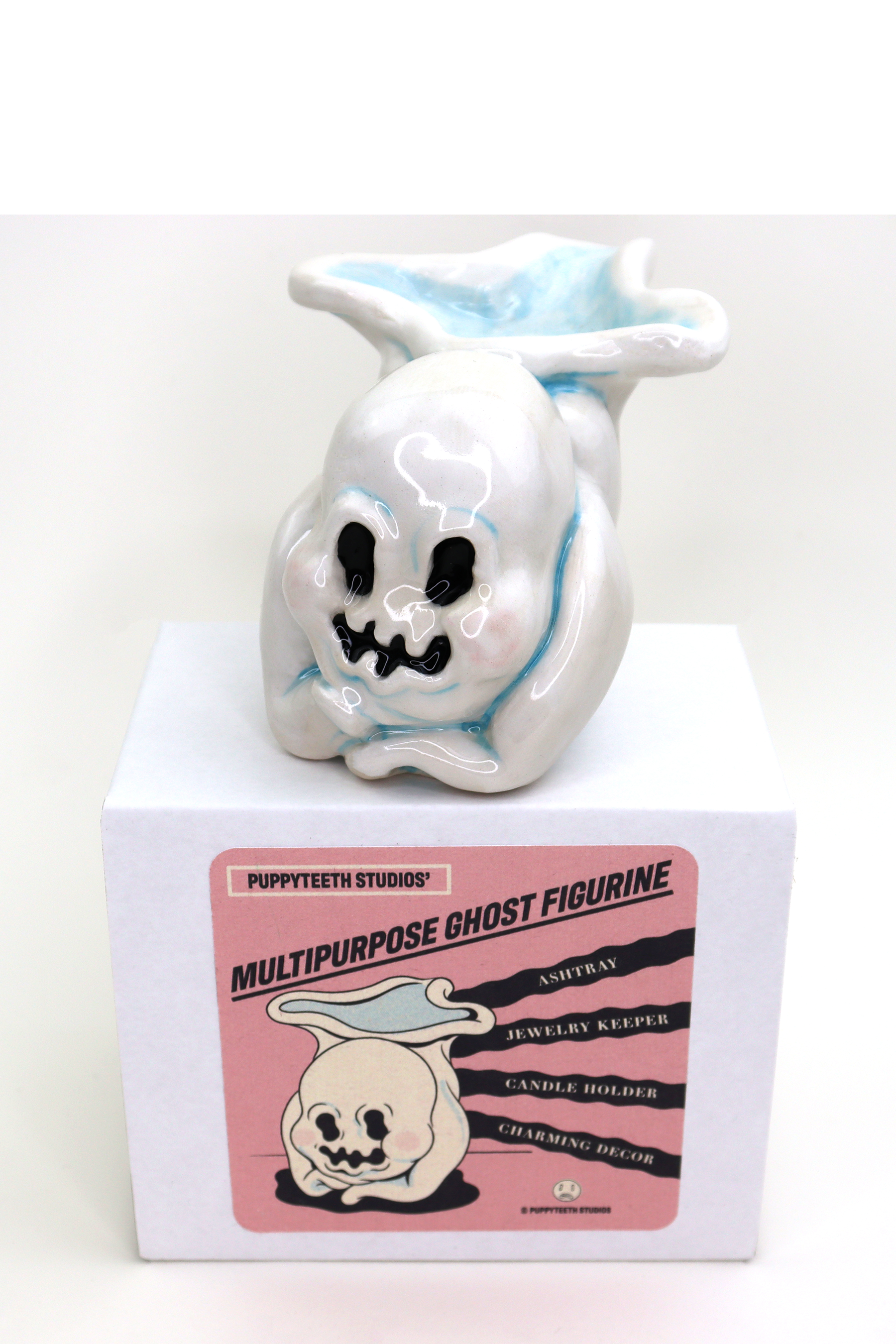 slip cast ceramic figurine designed and made by me