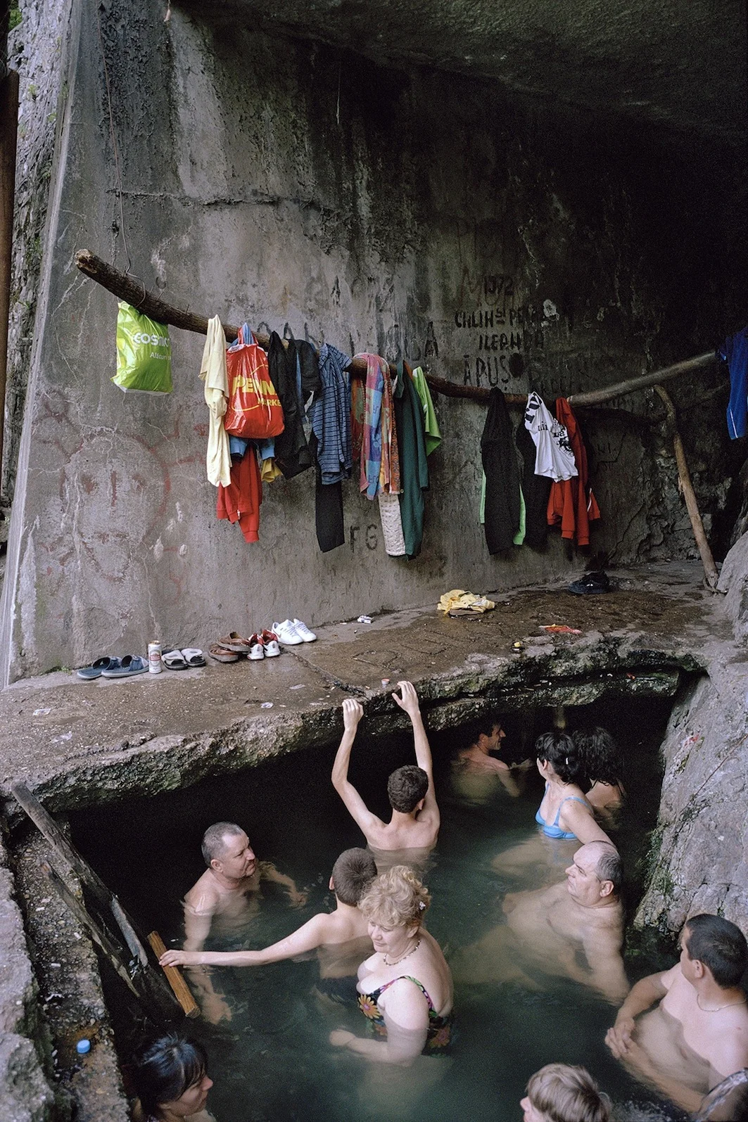 Florian Generotzky, from the series Risse in Beton, 2009 Florian Generotzky, Risse in Beton, 2009
Normal.dotm
0
0
1
79
454
Privat
3
1
557
12.0
0
false
21
18 pt
18 pt
0
0
false
false
false
/* Style Definitions */
table.MsoNormalTable
{mso-style-name:"Normale Tabelle";
mso-tstyle-rowband-size:0;
mso-tstyle-colband-size:0;
mso-style-noshow:yes;
mso-style-parent:"";
mso-padding-alt:0cm 5.4pt 0cm 5.4pt;
mso-para-margin:0cm;
mso-para-margin-bottom:.0001pt;
mso-pagination:widow-orphan;
font-size:12.0pt;
font-family:"Times New Roman";
mso-ascii-font-family:Cambria;
mso-ascii-theme-font:minor-latin;
mso-fareast-font-family:"Times New Roman";
mso-fareast-theme-font:minor-fareast;
mso-hansi-font-family:Cambria;
mso-hansi-theme-font:minor-latin;} Florian Generotzky bereiste Länder entlang der Donau: Rumänien, Bulgarien, Serbien. Er fotografiertearchitektonische Zeugnisse der Zeit des Eisernen Vorhangs und zeigt das heutige Leben der Menschen in diesen bröckelnden Betonwelten – mal subtil und zurückhaltend, mal erschreckend direkt. Für Florian Generotzky sind diese Gebäude die „Kulisse eines neuen DAZWISCHEN“, ein Zeugnis des Spannungsfeldes zwischen Vergangenheit und Zukunft, Modernisierung und Tradition, Globalisierung und Nationalisierung und der Suche des Menschen nach Identität.