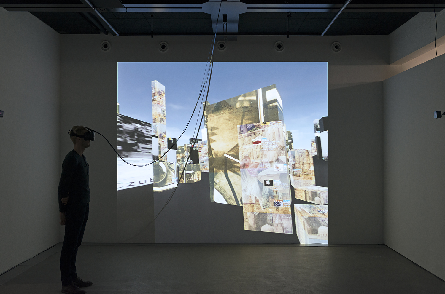 Exhibition view THE UNFRAMED WORLD at HeK Basel, artwork: Marc Lee, 10.000 moving cities - same but different (Version 4), 2016 (VR experience for HTC Vive) / Photo by Franz Wamhof