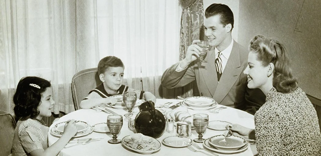 Mom and Dad listen to little Susan's story while Billy ponders the definition of poverty.