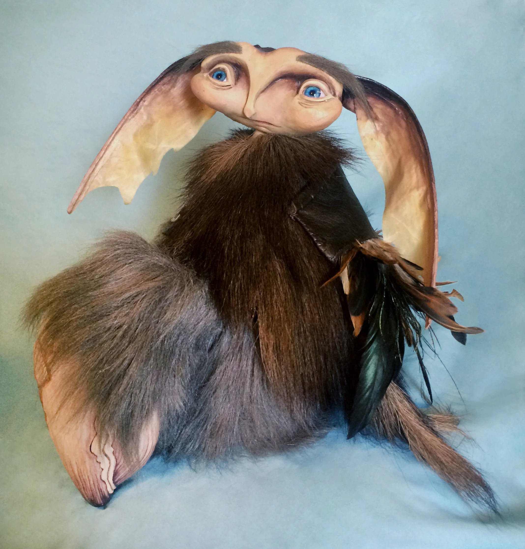 Say hello to Crabby Wigwam. He's a Dark Crystal inspired creature puppet that I built for giggles. He's made of rubber latex, acrylic, wood, leather, moose fur, fun fur, sculpey, and papier mache. He's totally movable, and his face is squishy! 