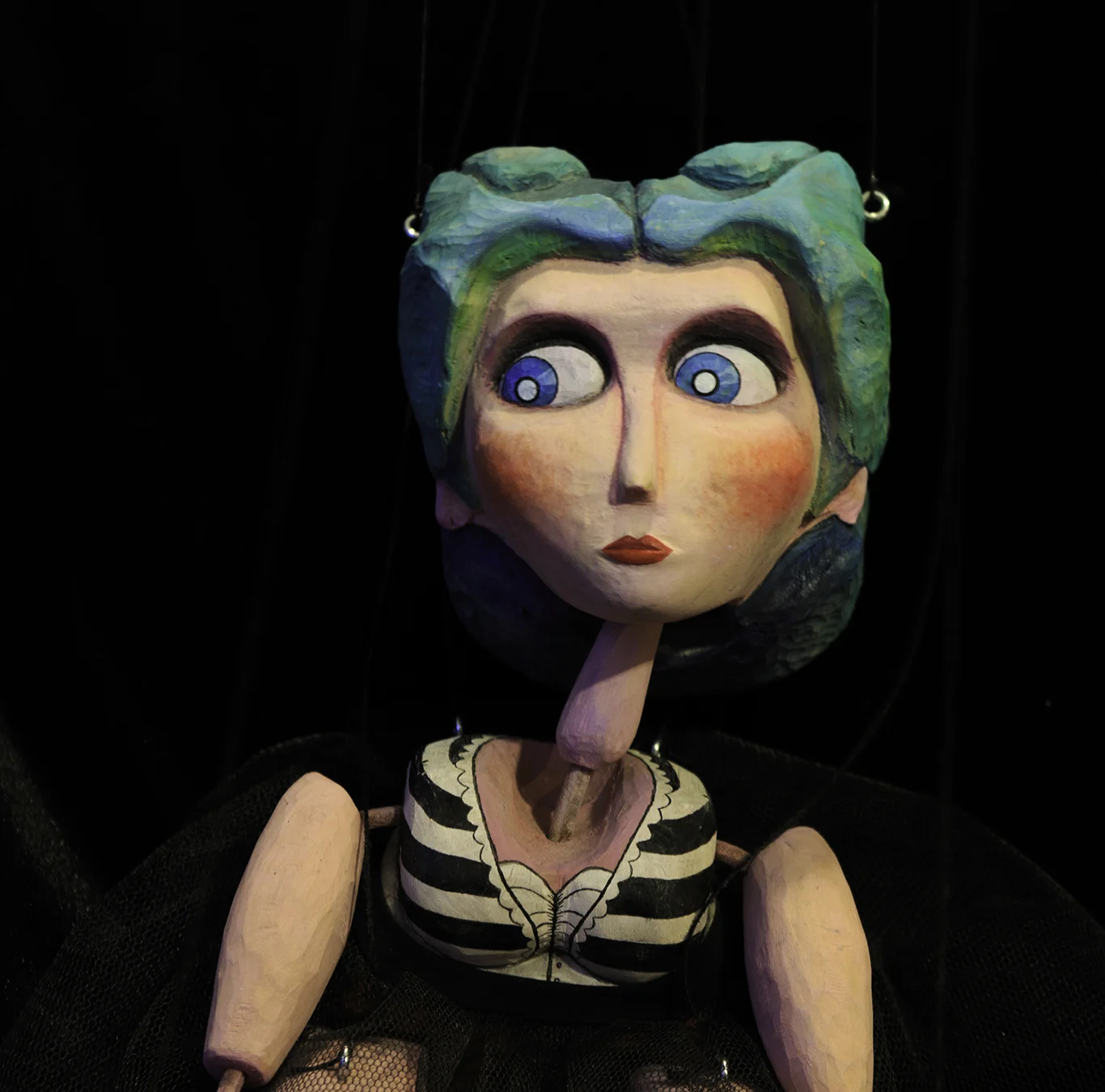 This is Delilah, the Strong Woman. She was the very first marionette that I built, as well as the largest. she stands a little over a foot tall. She is made of wood and leather and fully manipulatable. She performed in the 2011 Prague Quadrennial Festival in a street production. Photo by Richard Casteel. http://www.capturingmilliseconds.com ~ SOLD