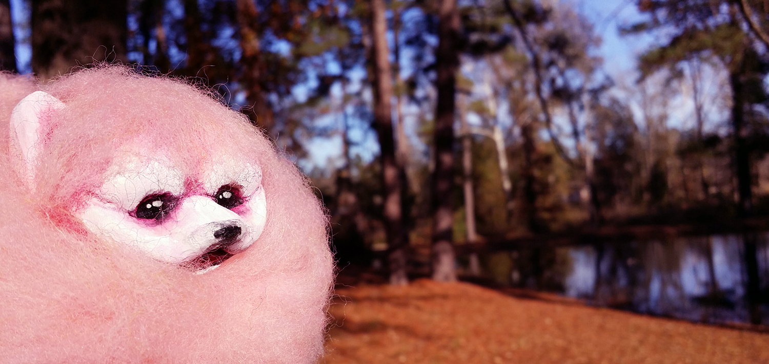 Meet Turbo! This is the smallest wooden sculpture that I've carved. She is a pink Pomeranian based off of my sister's real-life Pomeranian, Turbo Barbie. She is made from a single piece of basswood, and pink felt roving was used to create the fur. Her tail is made from a piece of wire with the roving sewn on to mock the true Pomeranian curly-q tail. ~ SOLD