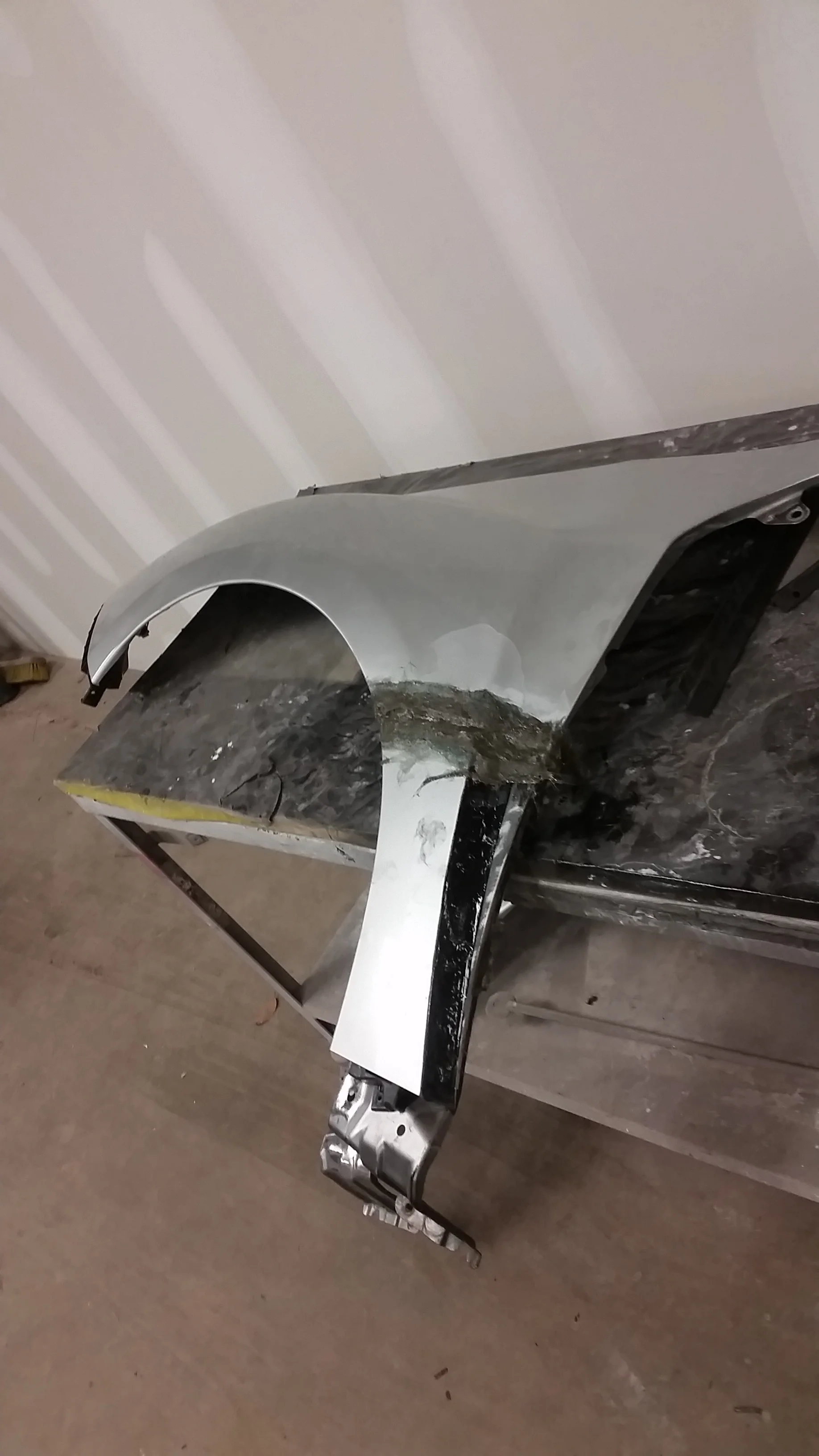 -the factory badging and space provided was closed off and sealed. -the factory plastic vent opening was plastic welded and closed shut.