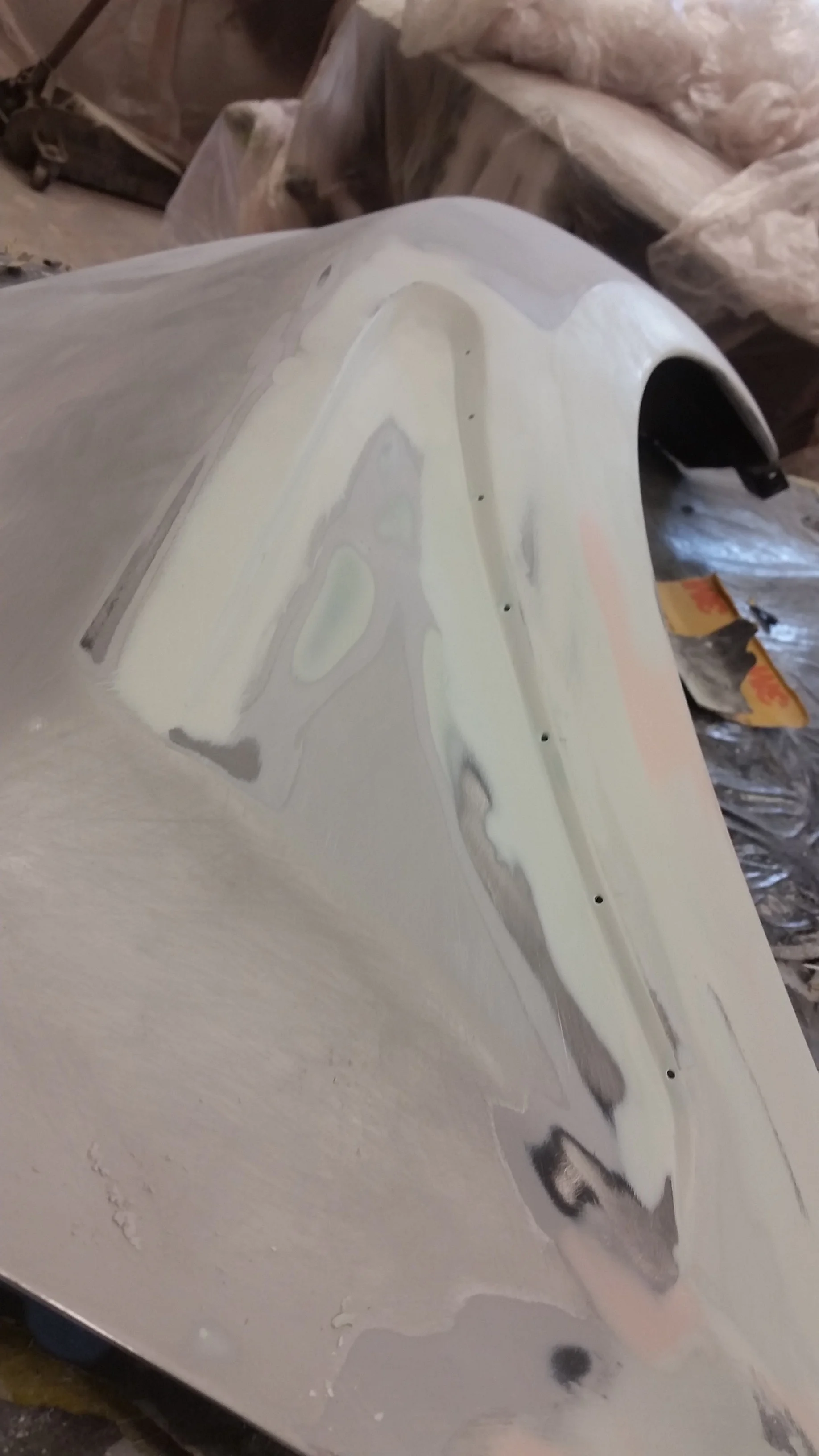 -rather than a traditional slot opening, aesthetic holes were created to give a unique look. 