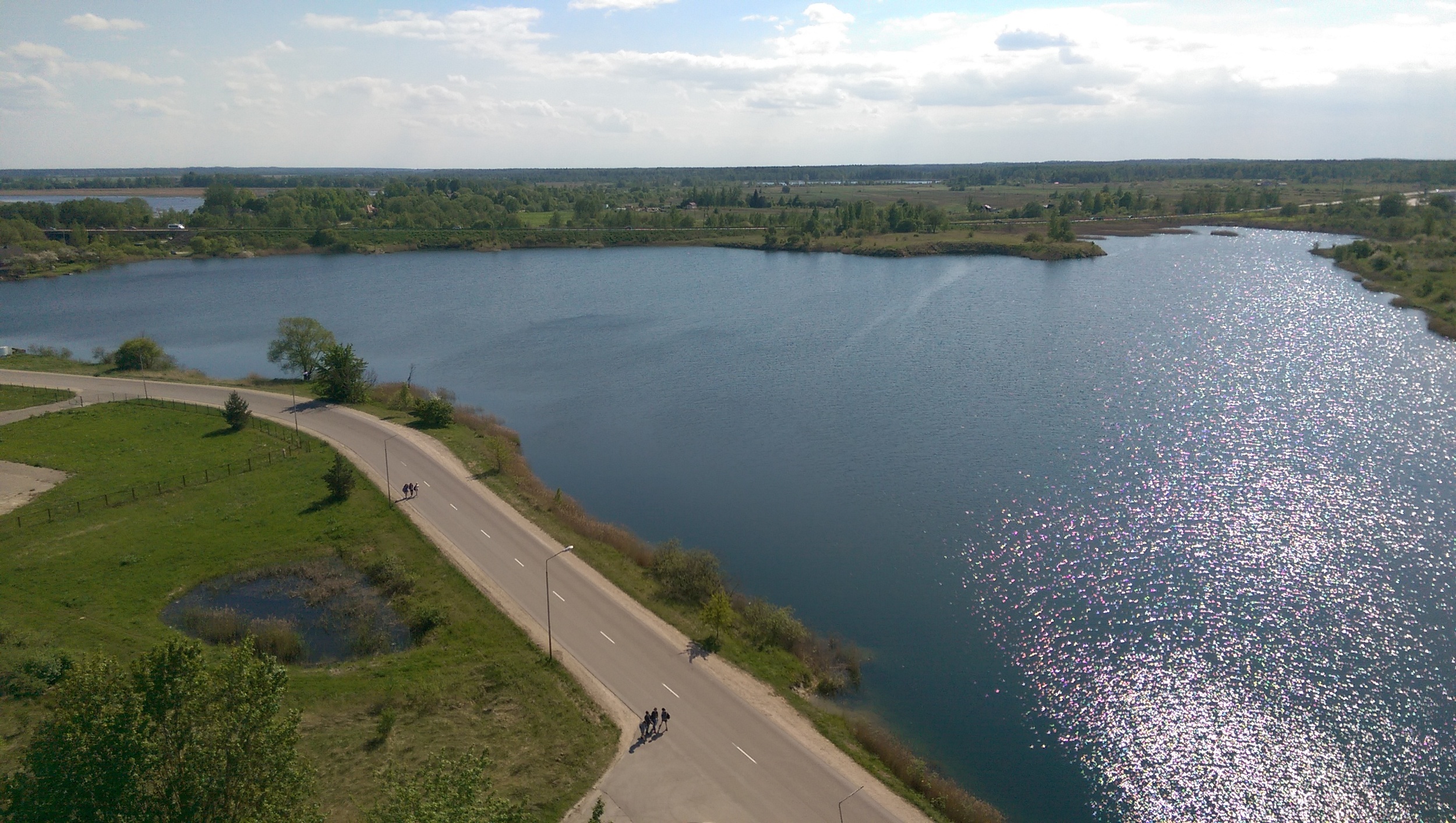 The good stuff: the above is part of the view from the top of the tower. What a view. The road and lake are in front, and you can see the river Lielupe in the background behind the trees.