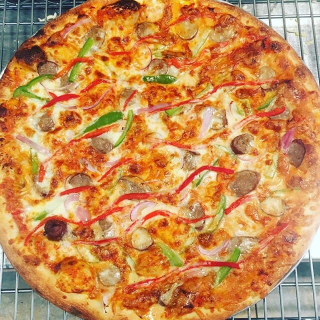 Party Gras - Cajun cream, mozzarella, provel, @patchworkfamilyfarms andouille, peppers, onions. By the slice and whole pie all week.