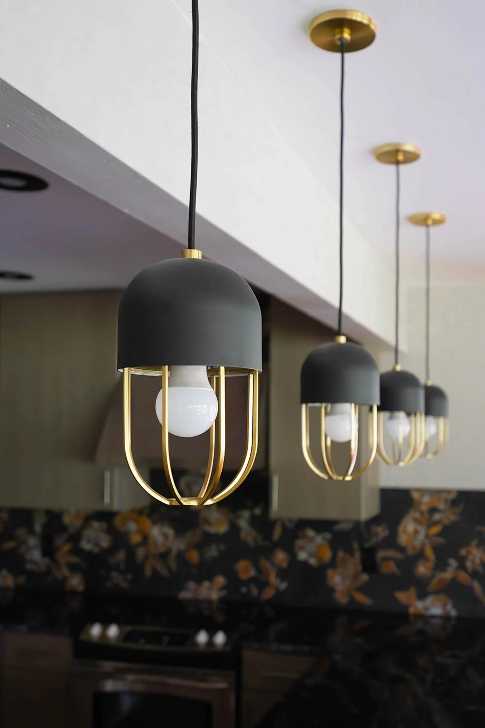unique pendant lighting with gold and black finishes