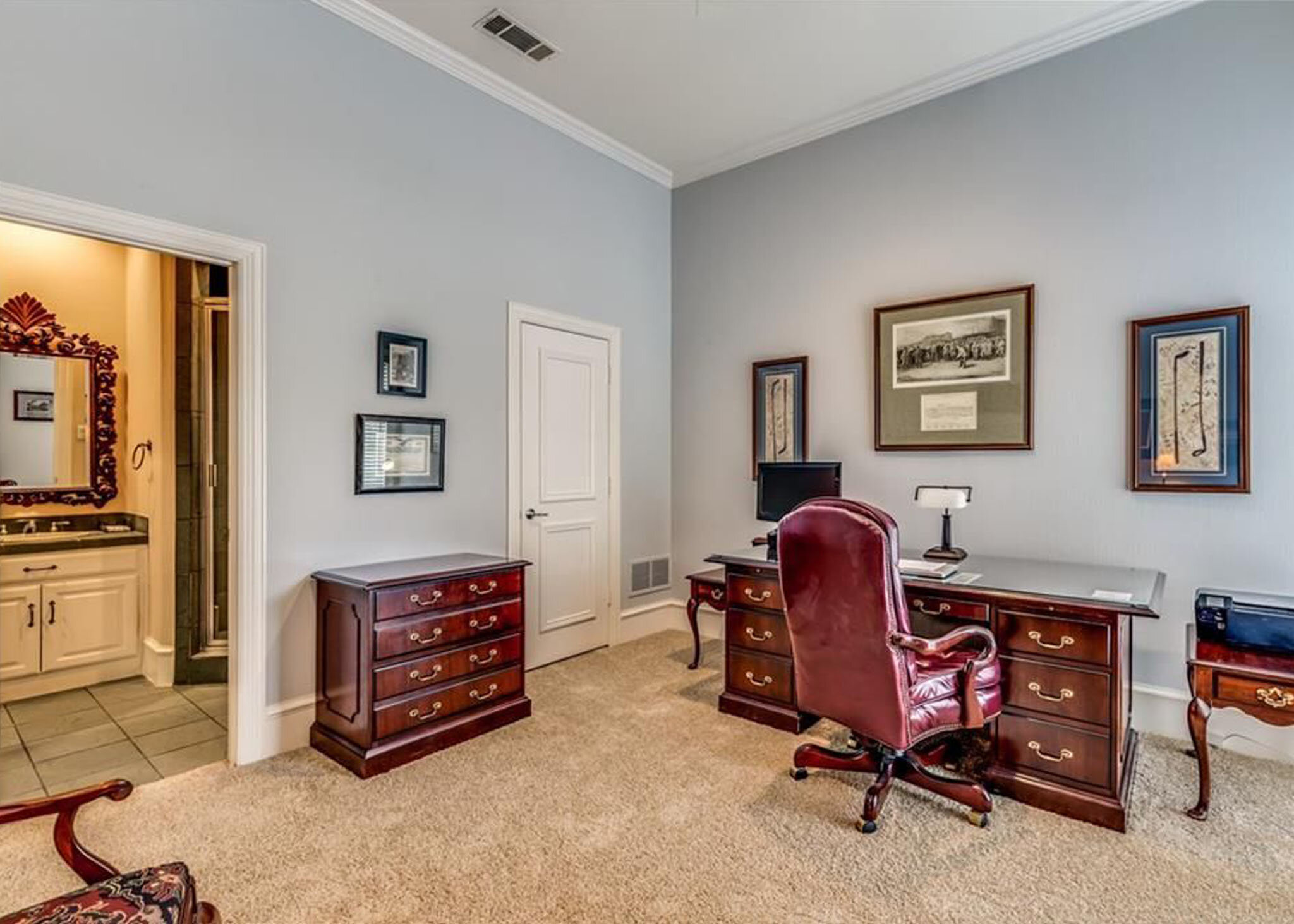 Before photos of a dated bedroom used a home office