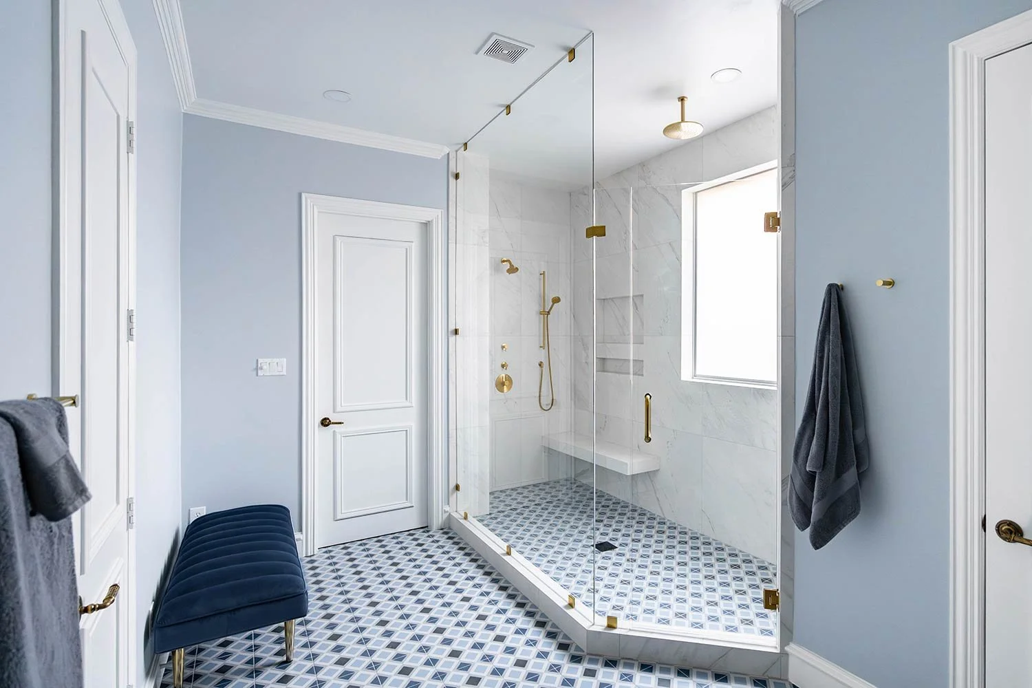 Custom walk in shower with large bench and hand shower