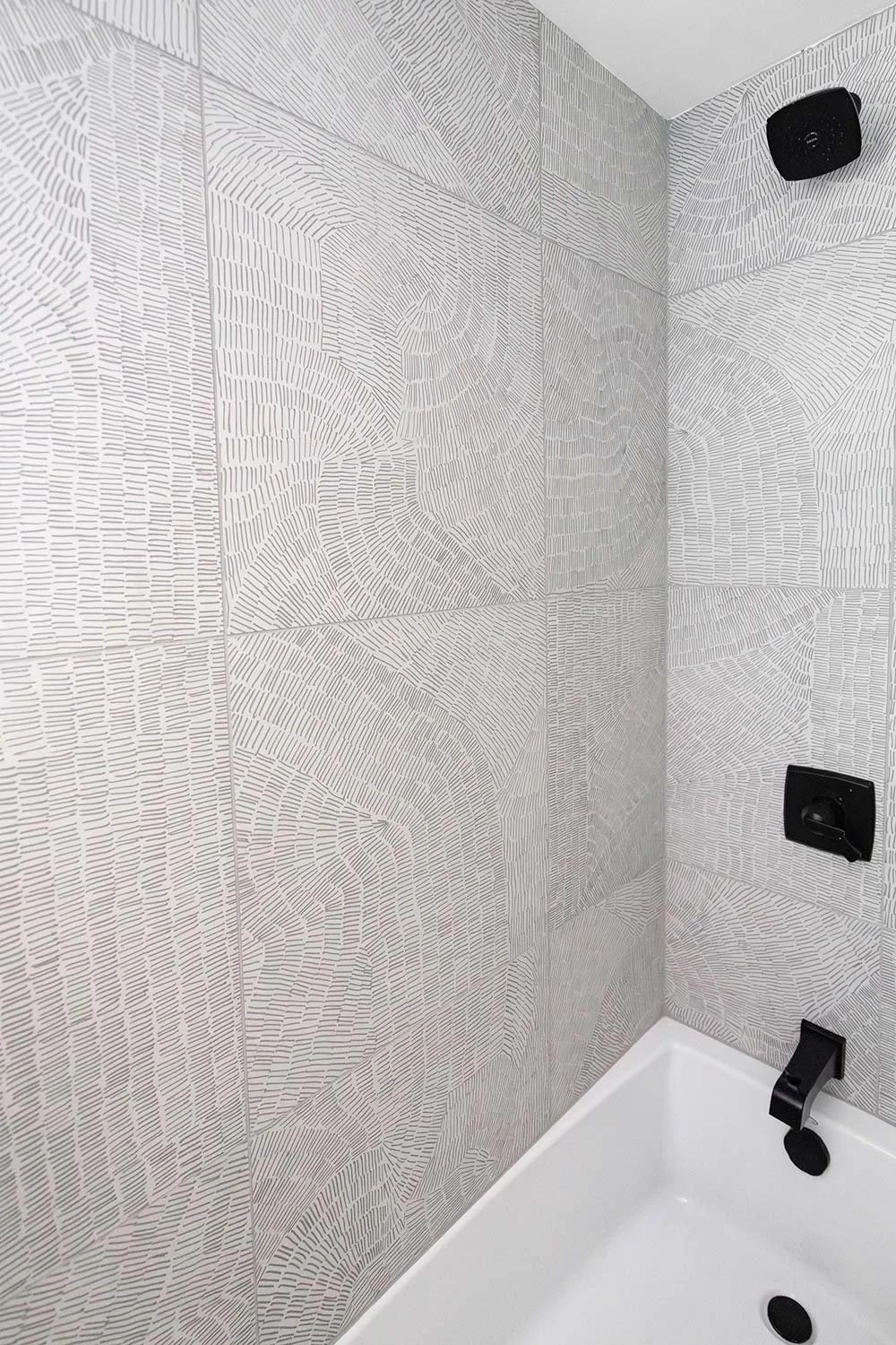 Modern shower design with organic tile