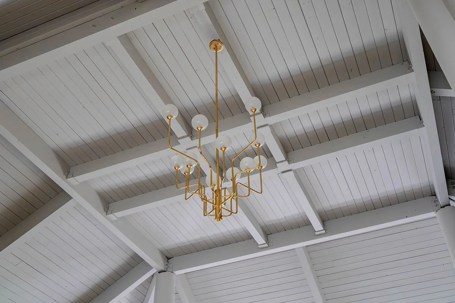 Bright gold lighting and with white ceiling