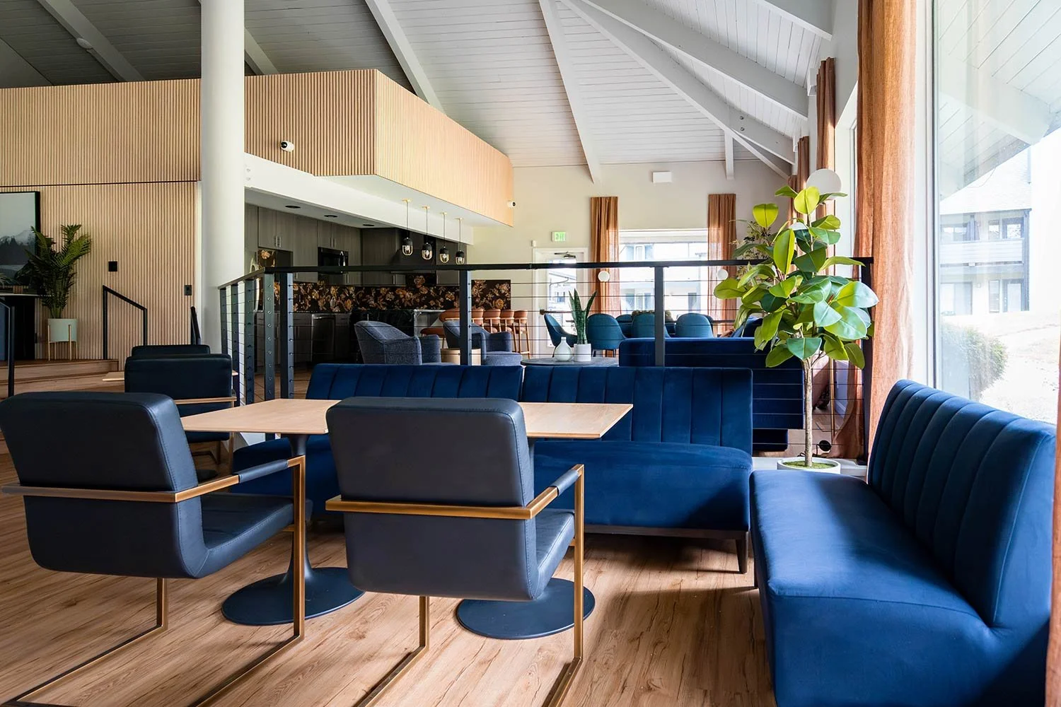 bright blue clubhouse design with unique wood accessories