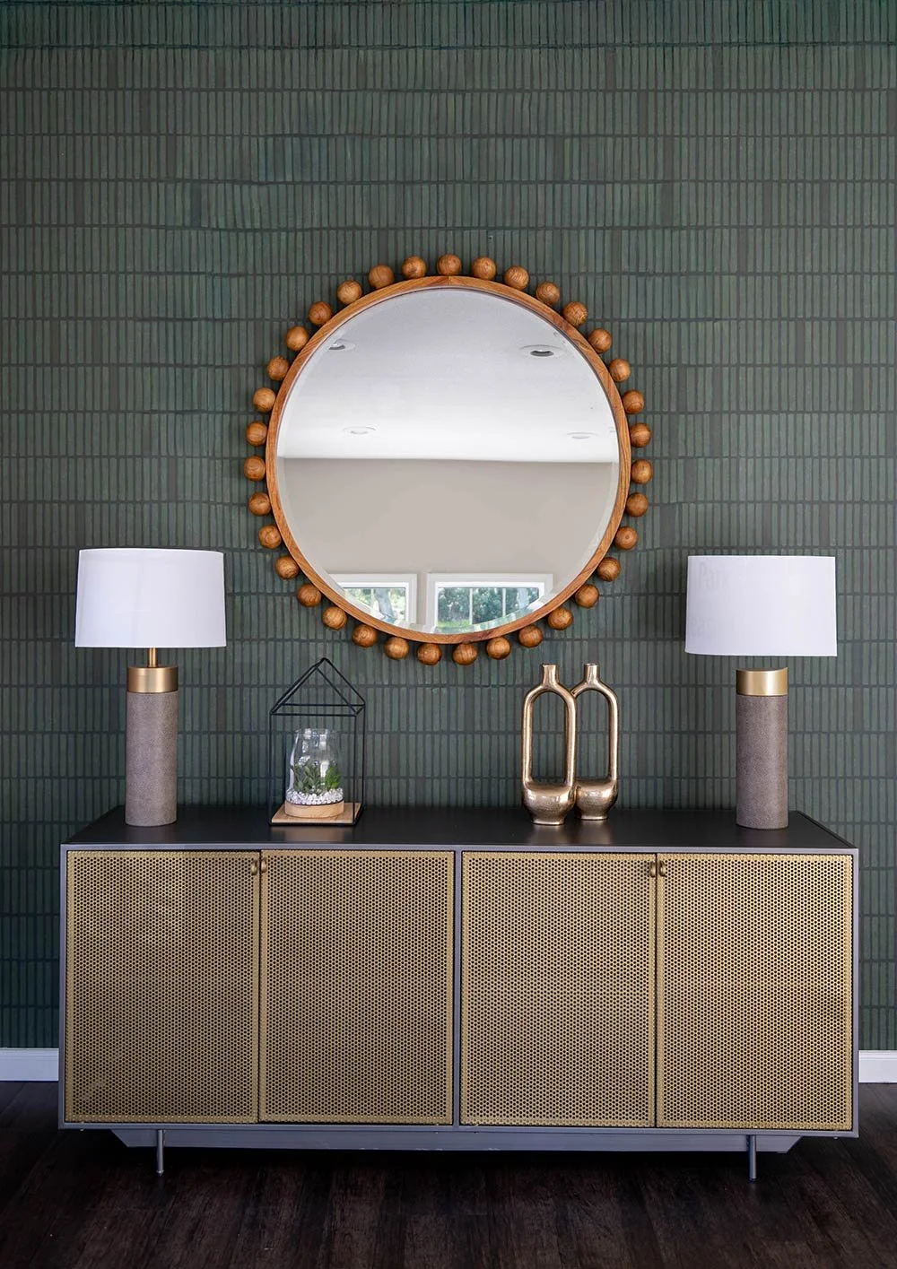 Green and blue wallpaper with wood mirror
