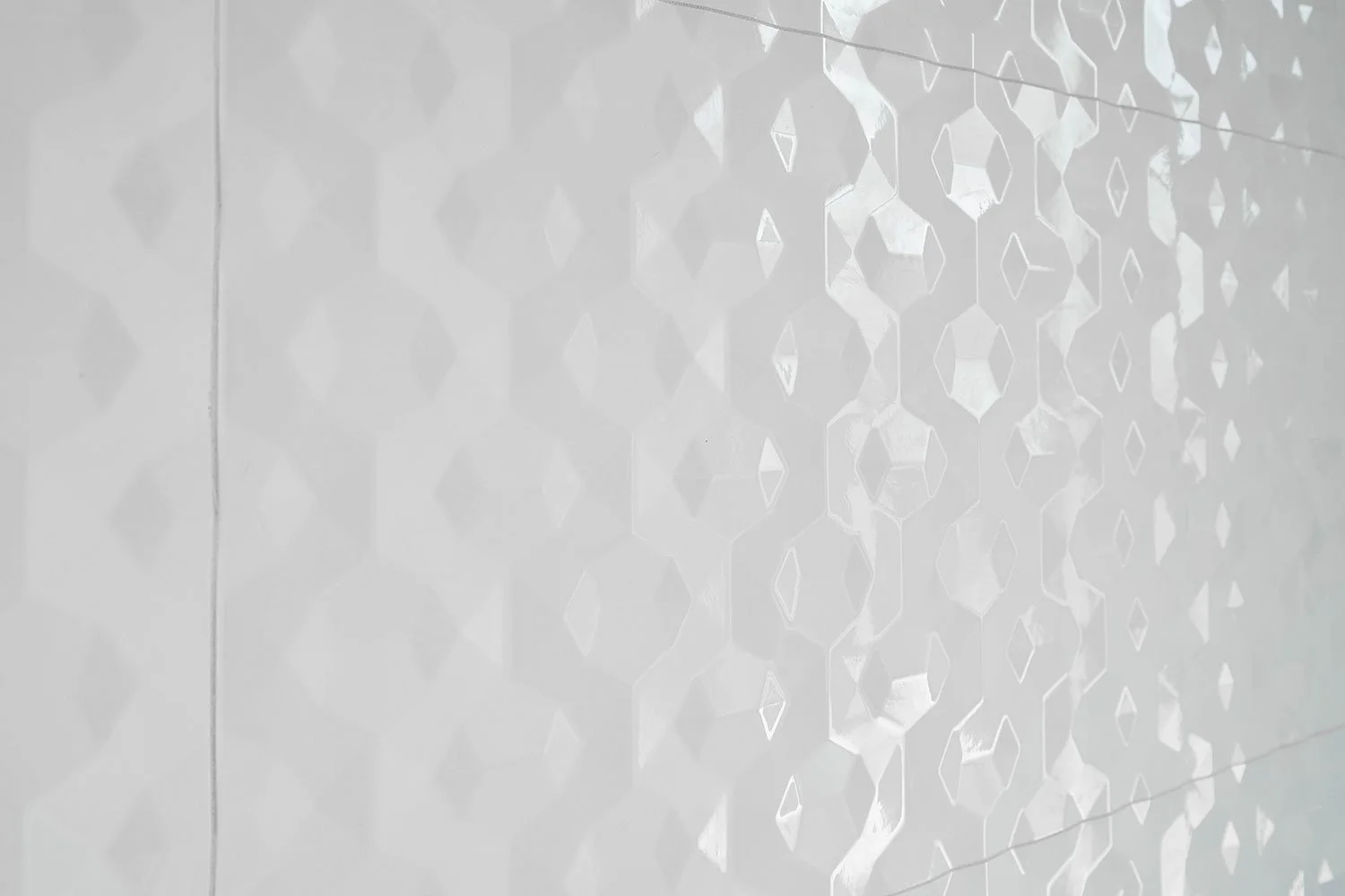 geometric white tile large format tile in walk in shower