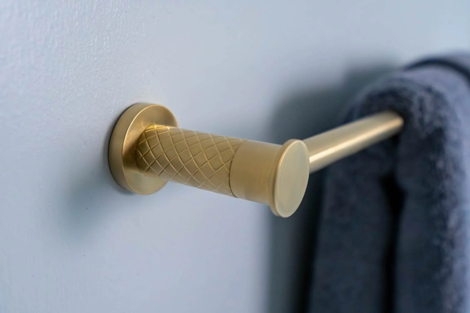Gold hardware with etched detailing