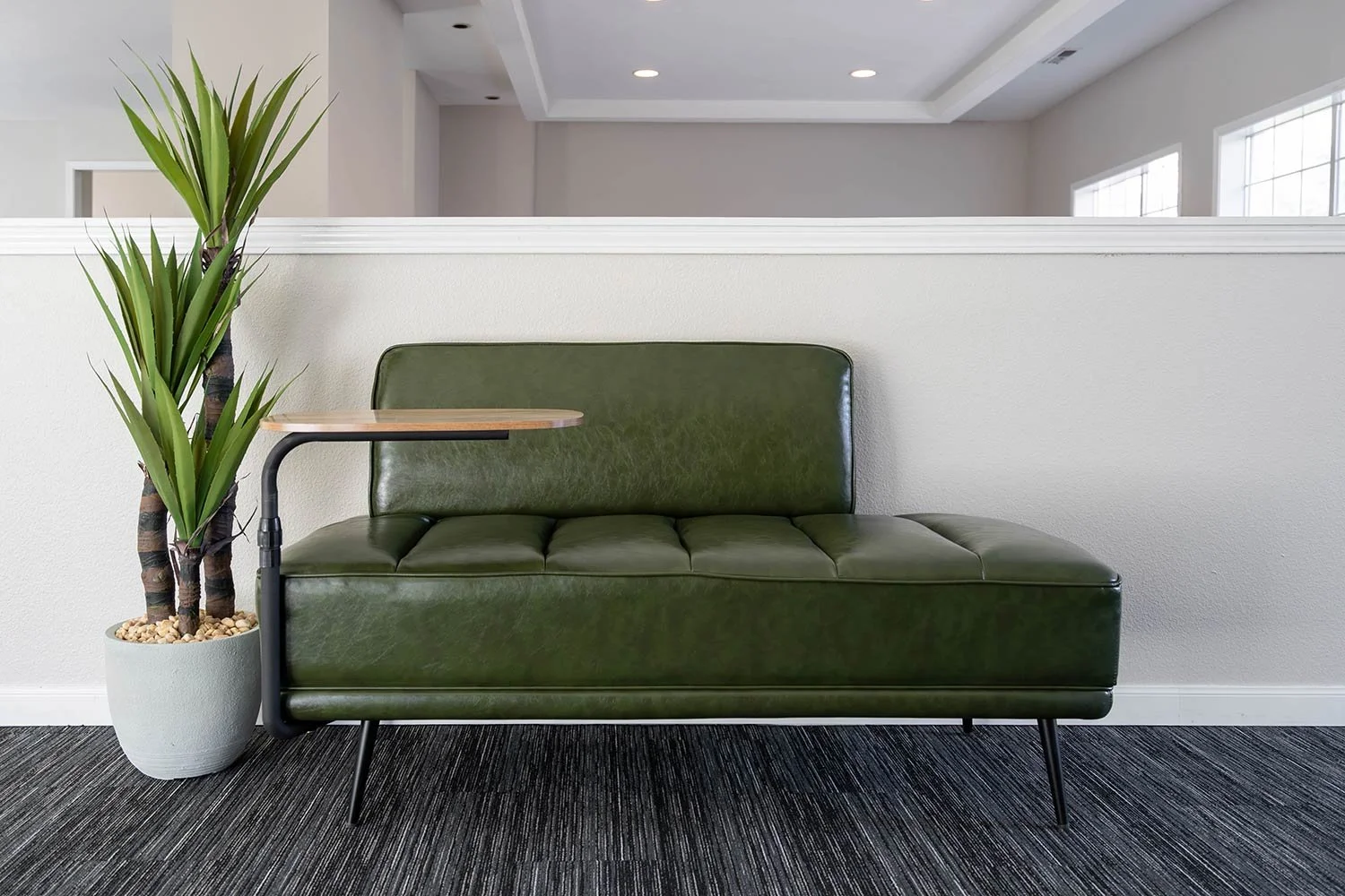 unique green leather couch with attached side table