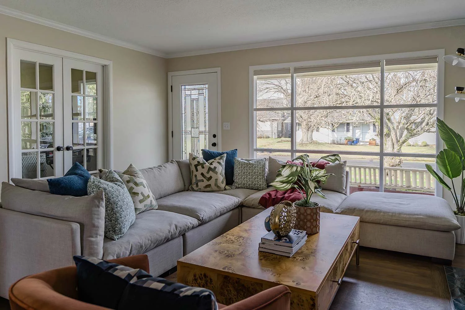 large coffee table in living room with cloud couch