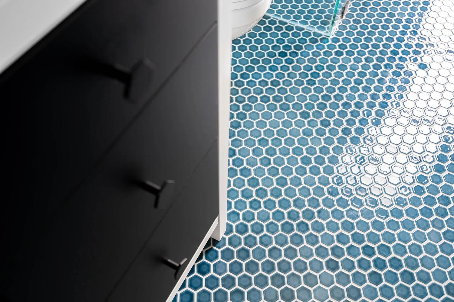 blue tile in bathroom design black cabinets