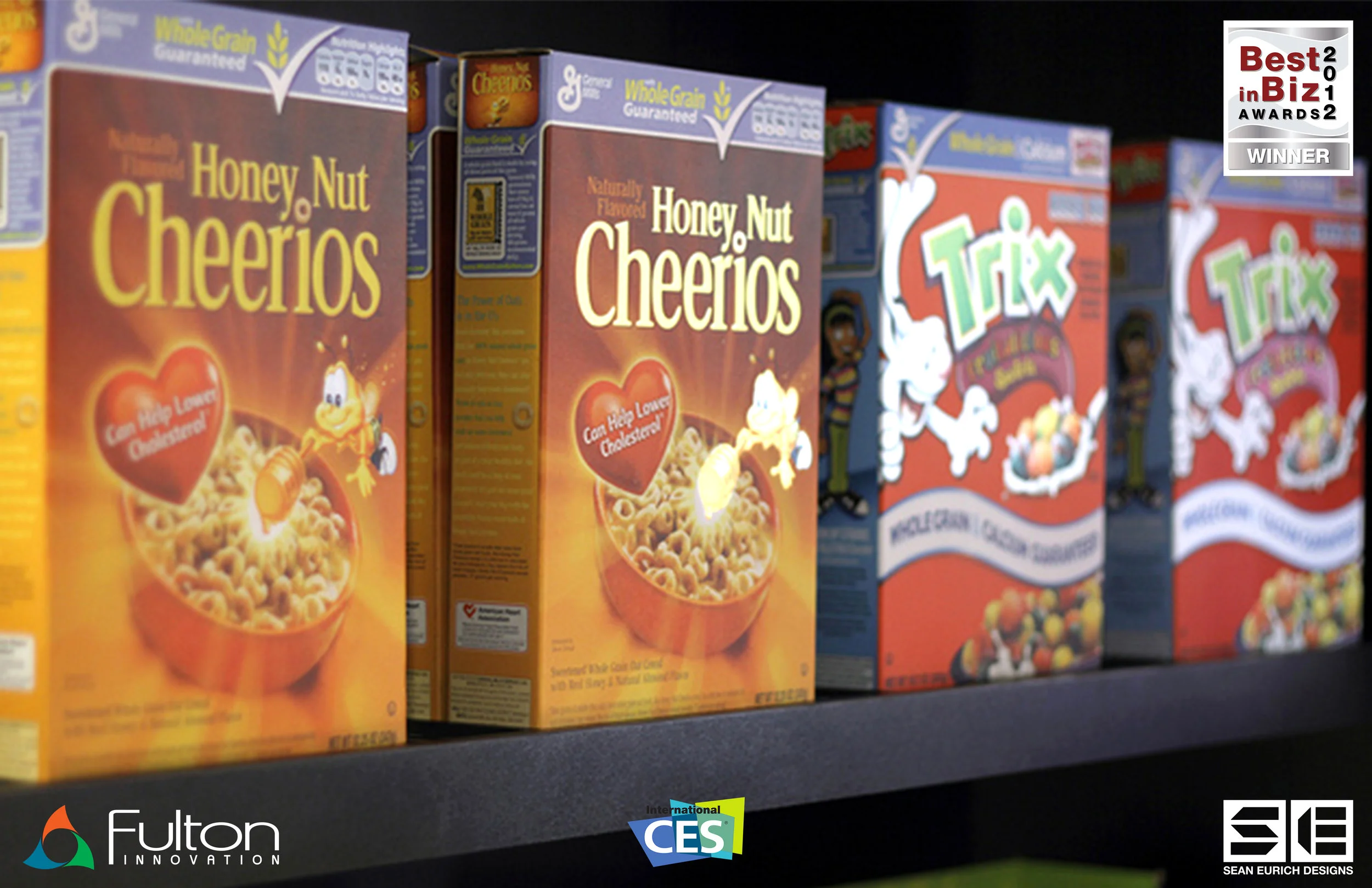  Printed electronic, light-up cereal boxes I prototyped for the 2012 Consumer Electronics Show. They are wirelessly powered by eCoupled technology when placed on the shelf and individual graphic segments light up in sequence. eCoupled printed electro